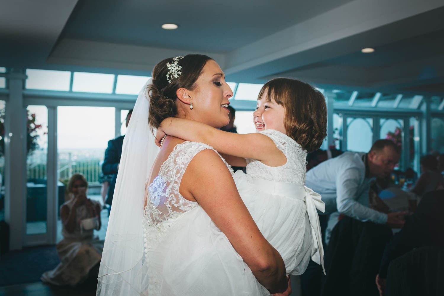 Bride dancing with her babies The New House Country Hotel, Thornhill, Cardiff with south wales wedding photographer 