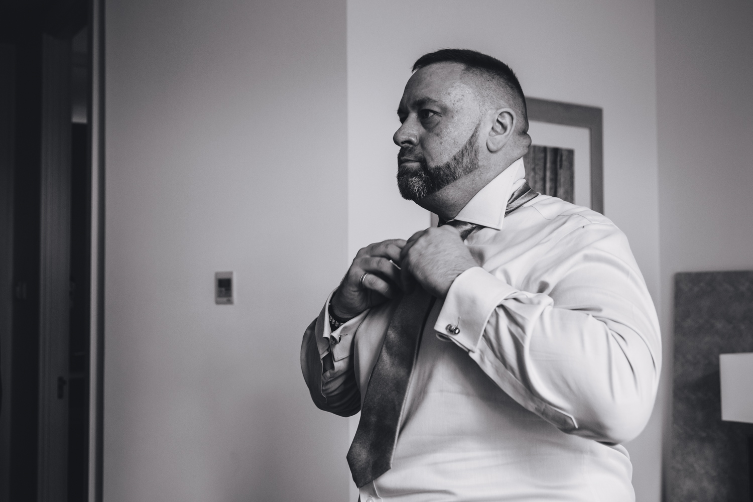groom prep for our gay wedding at park plaza hotel and cardiff city hall with gay friendly south wales wedding photographer