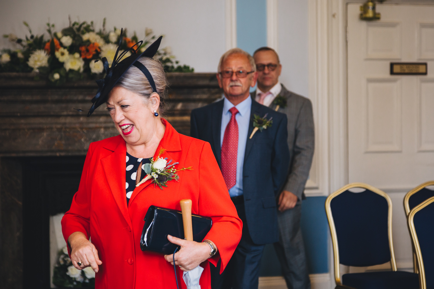 mother of the groom at gay wedding ceremony at cardiff city hall with gay friendly south wales wedding photographer