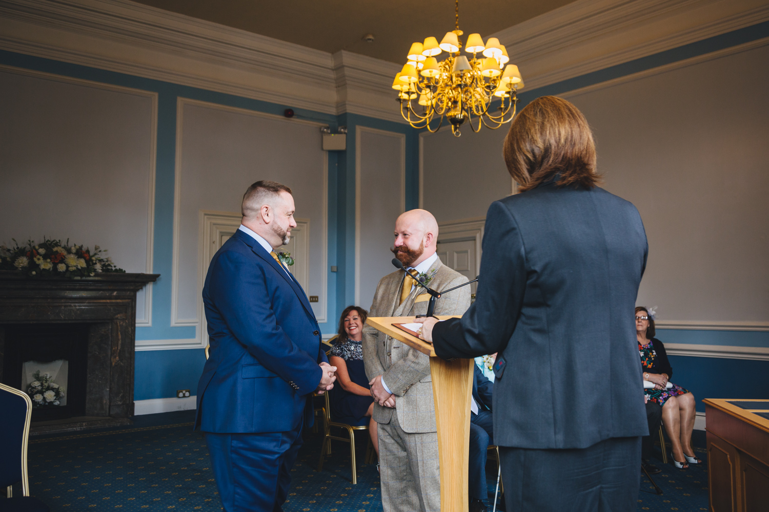 gay wedding ceremony for 2 grooms at cardiff city hall with gay friendly south wales wedding photographer