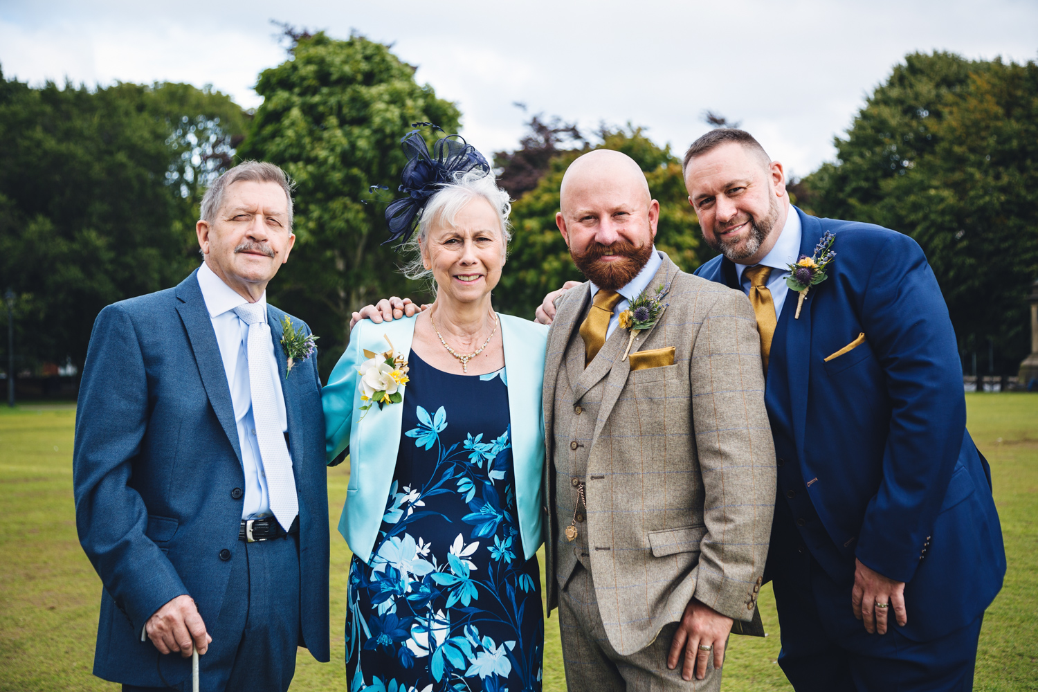 grooms family at cardiff city hall gay wedding with gay friendly south wales wedding photographer