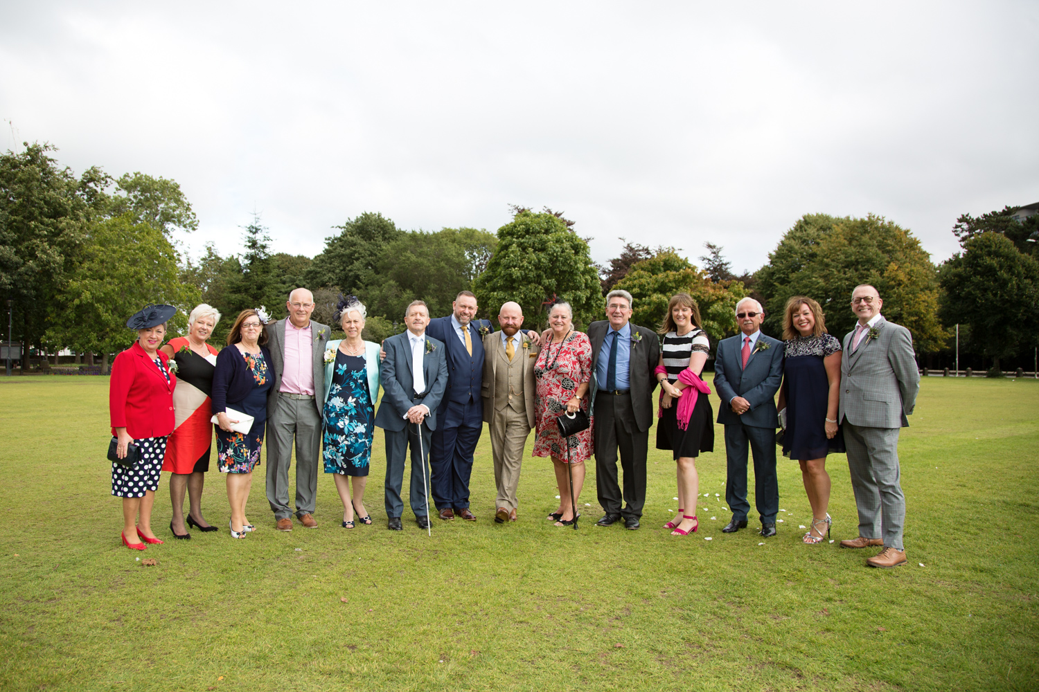 group shot at cardiff city hall gay wedding with gay friendly south wales wedding photographer