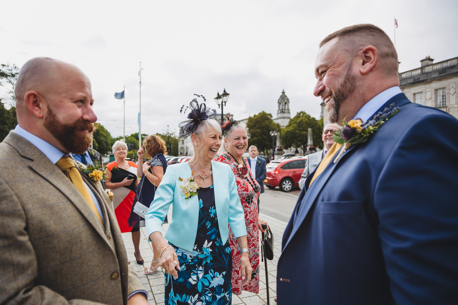 friends of the grooms at cardiff city hall gay wedding with gay friendly south wales wedding photographer