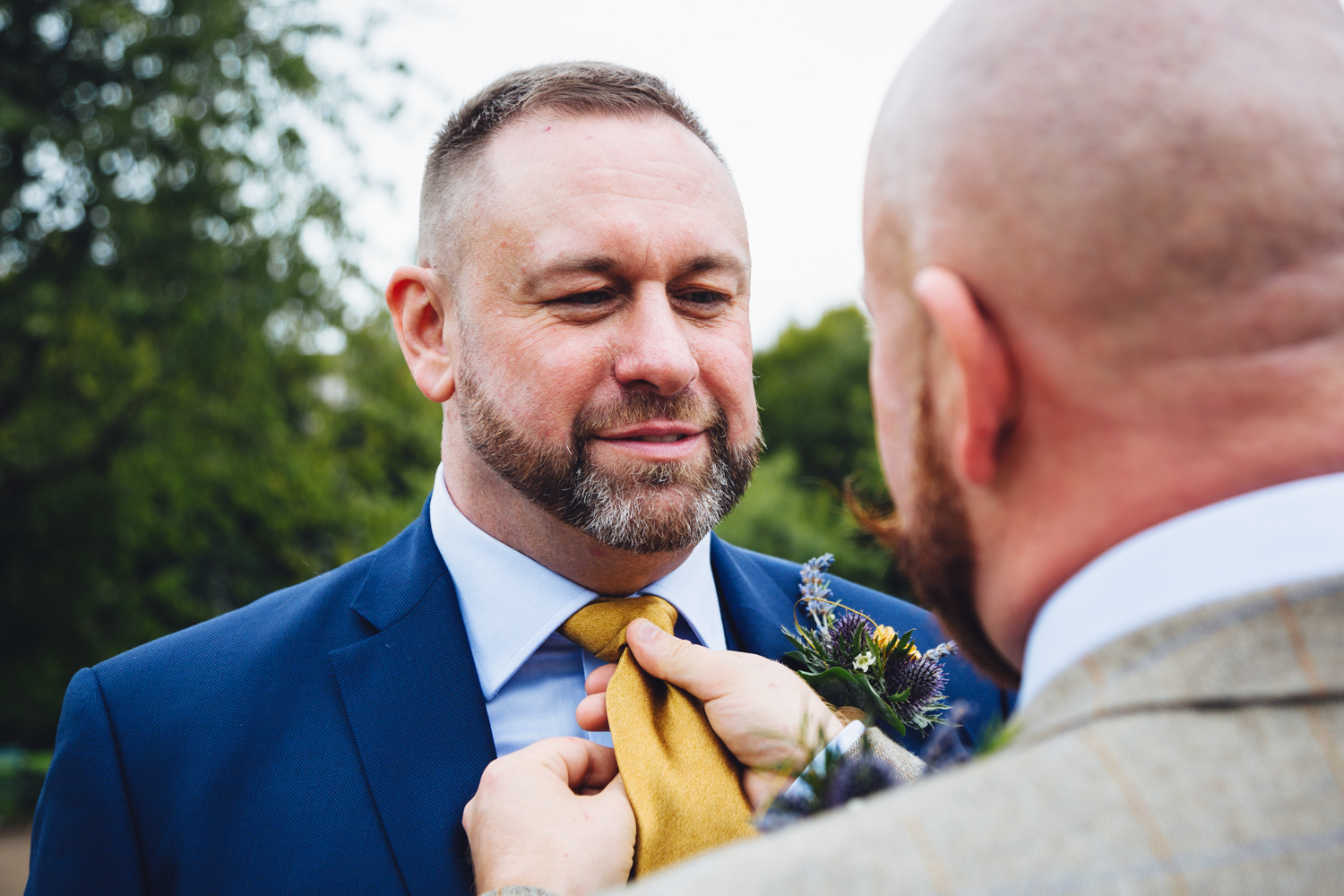 husband and husband photos at cardiff city hall and museum with gay friendly south wales wedding photographer