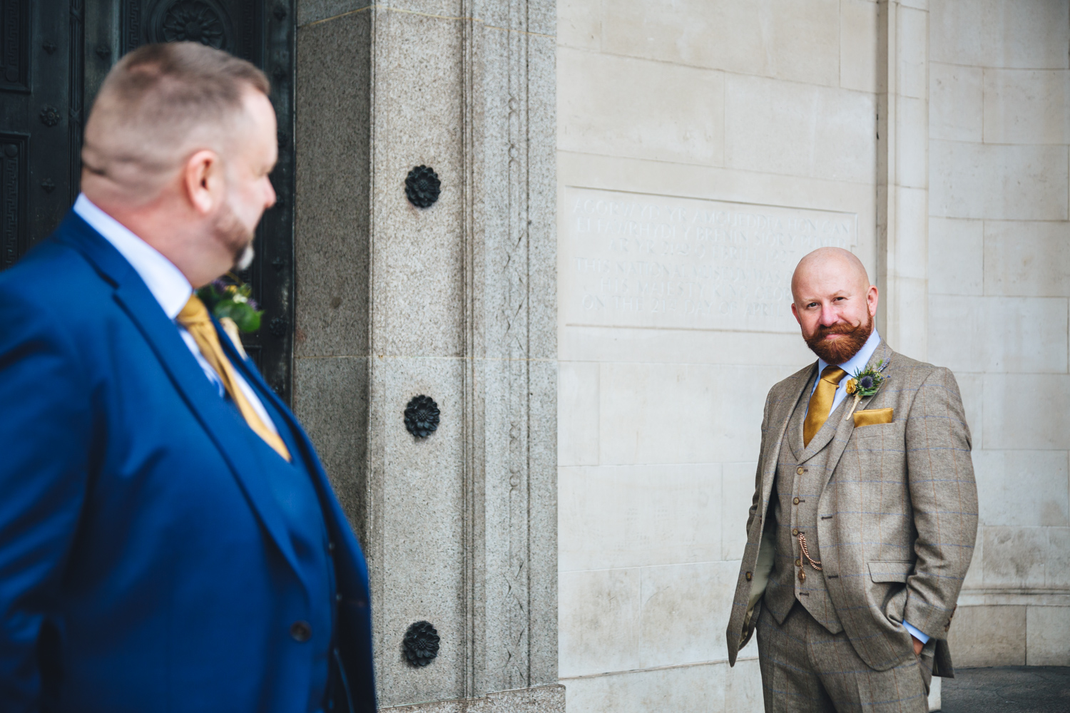 Cardiff museum with 2 grooms on their wedding day with gay friendly south wales wedding photographer 