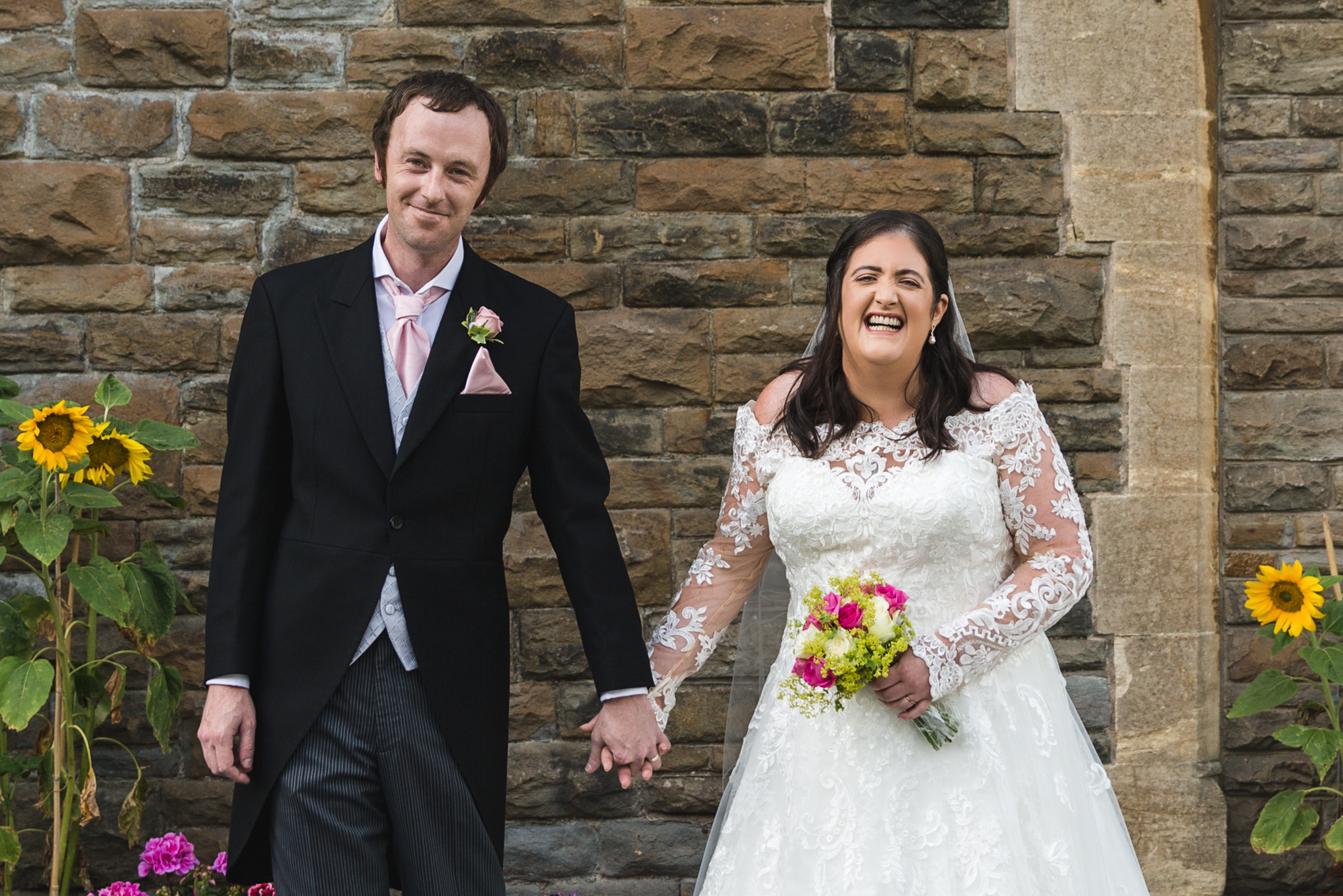 bride and groom natural wedding photo at St Martins Church, Caerphilly