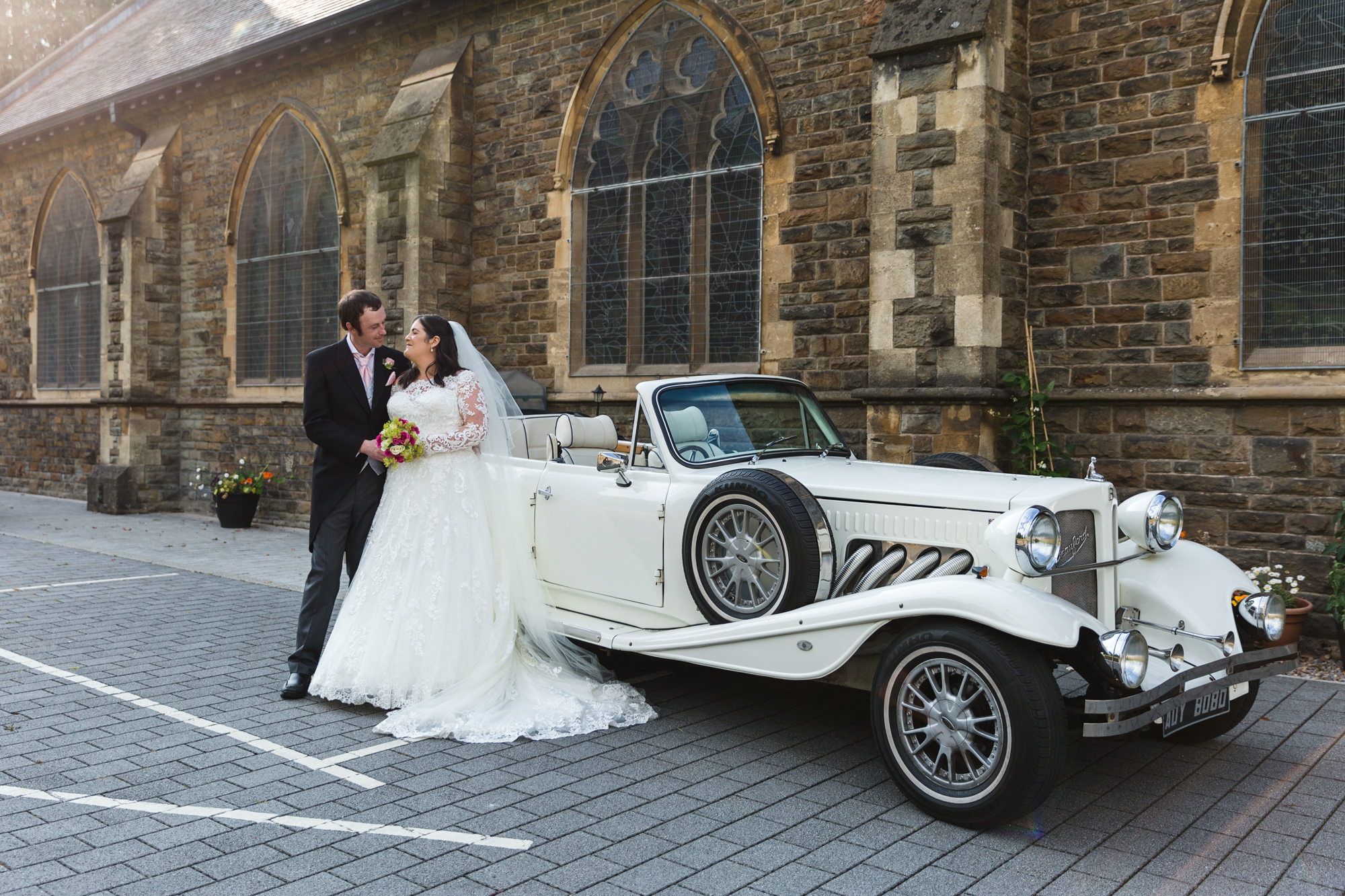 bride and groom portraits with wedding car, rolls royce