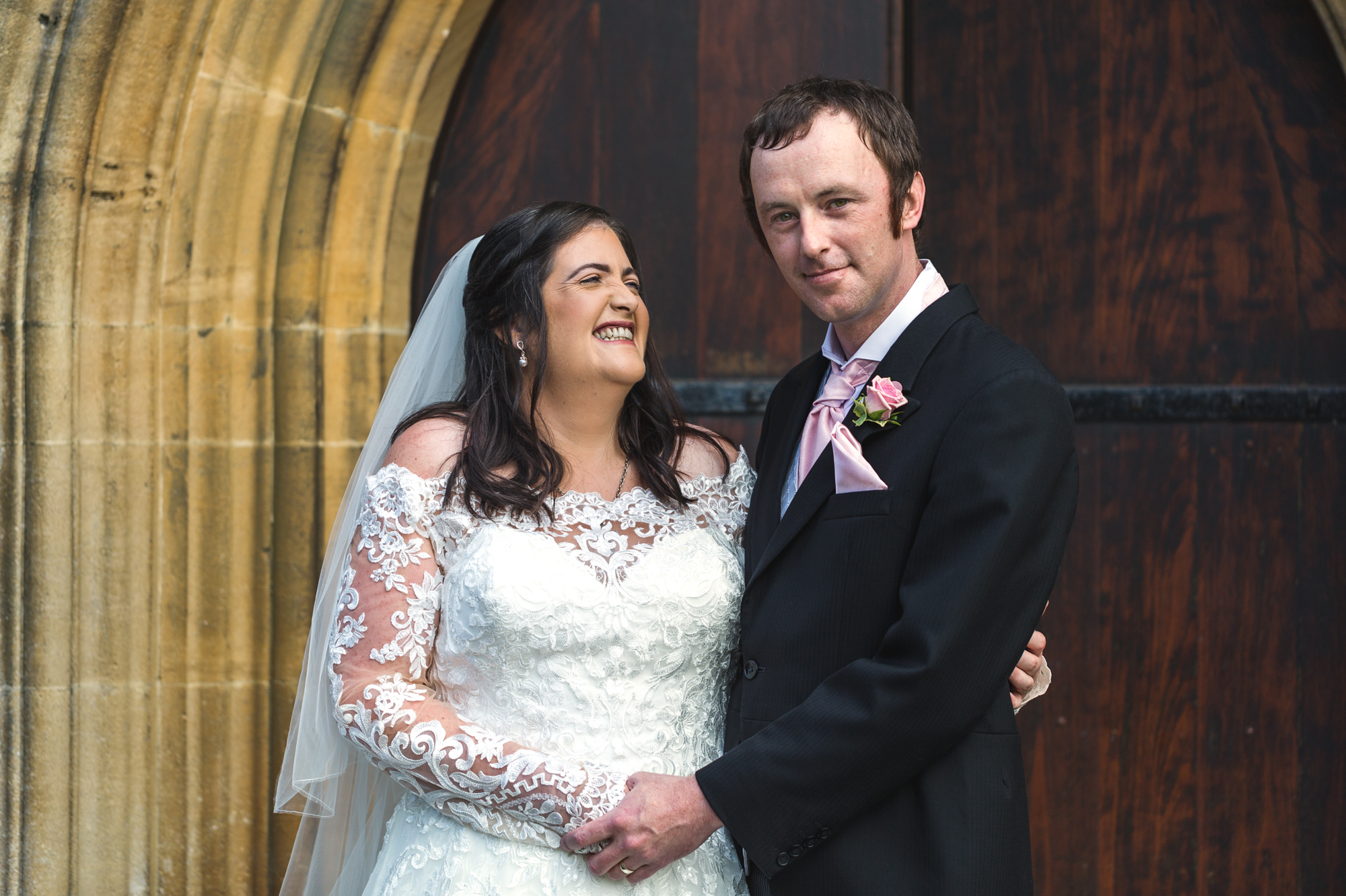 bride and groom photos outside St Martins church, Caerphilly