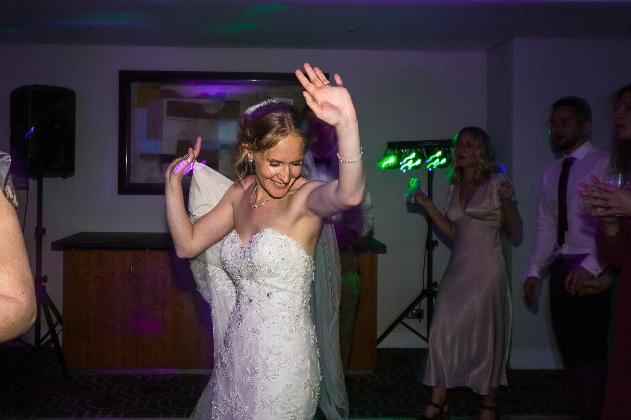 bride dancing at wedding at st davids hotel cardiff bay