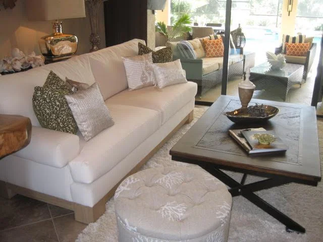 A white faux fur rug finishes off this living space.