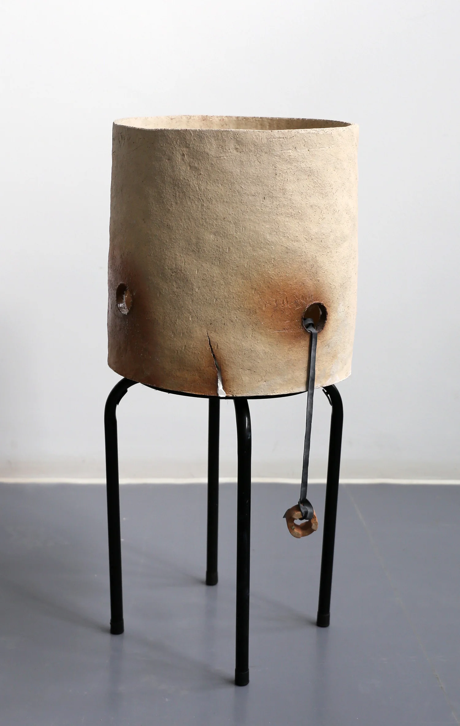 <font size="3"> Crackpot 03 <br><br> <font size="1">Found stool, ceramic, <br> inner tube, plaster, kiln prop <br><br> 2016