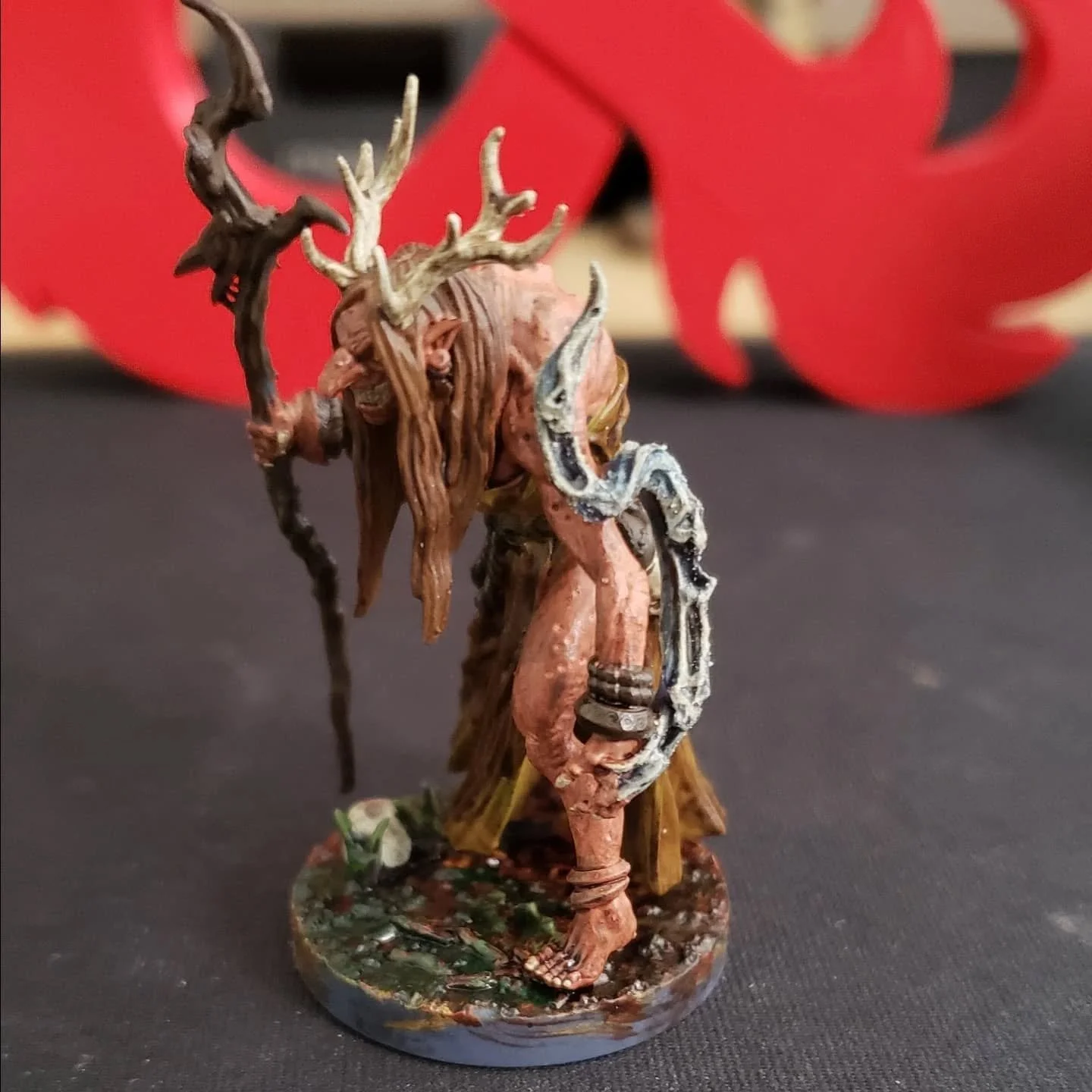 Almost finished painting this mini (still have the base to do). I think it turned out neat, I used some glow in the dark paint on the magic skulls on her left arm.