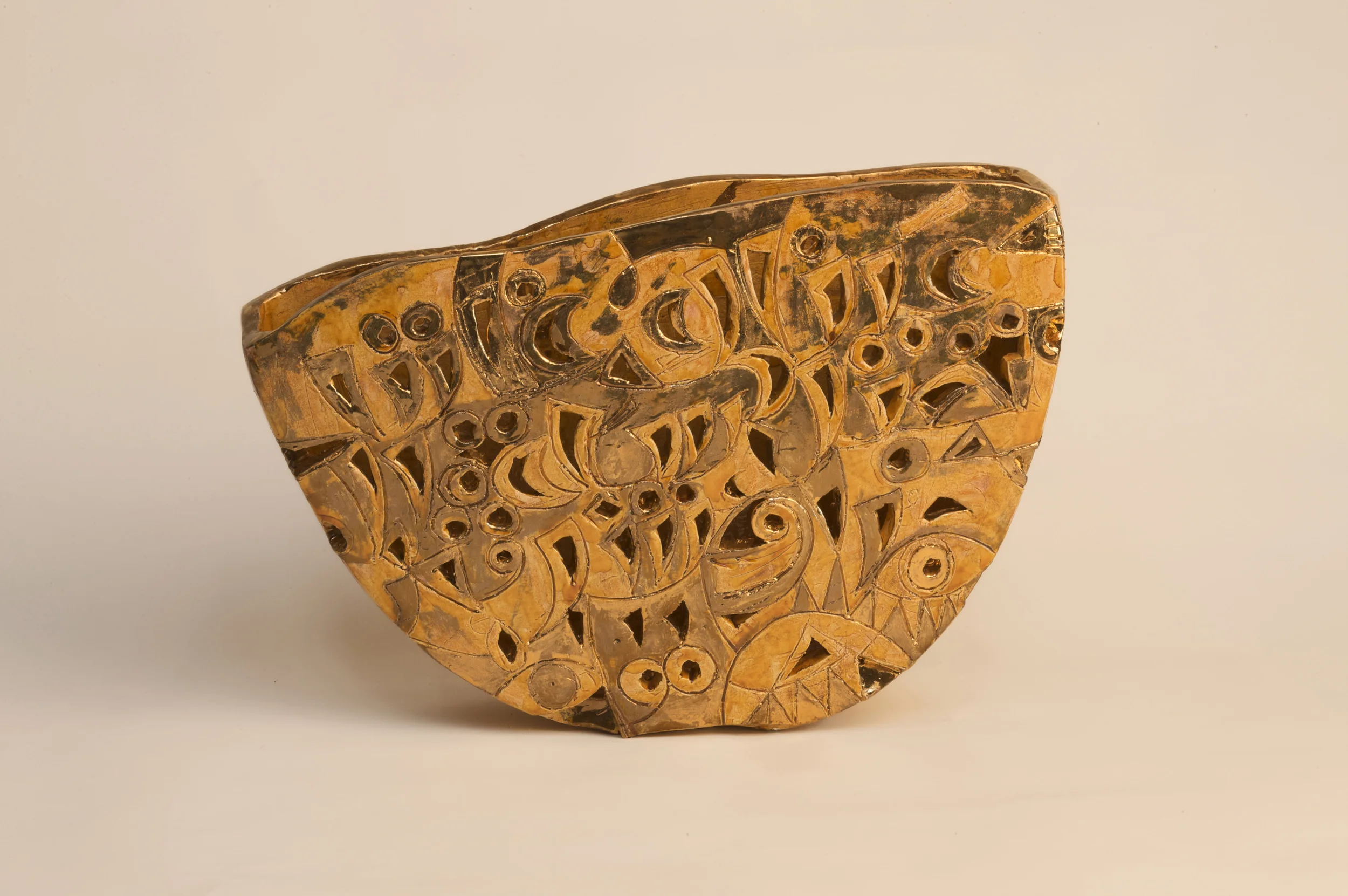 Ainaki Ghabeta Nekheel II Earthstone amber glaze and 24K gold 29x40x10cm 2008 . Inspired by the famous poem أنشودة المطر (Rain Song) by the late Iraqi poet Bader Shaker al-Say'yab with inscriptions of the opening verses. In this poem he combines his personal tragedy and the sociopolitical tragedy of his beloved homeland, Iraq. His words are as relevant today as the day they were written.