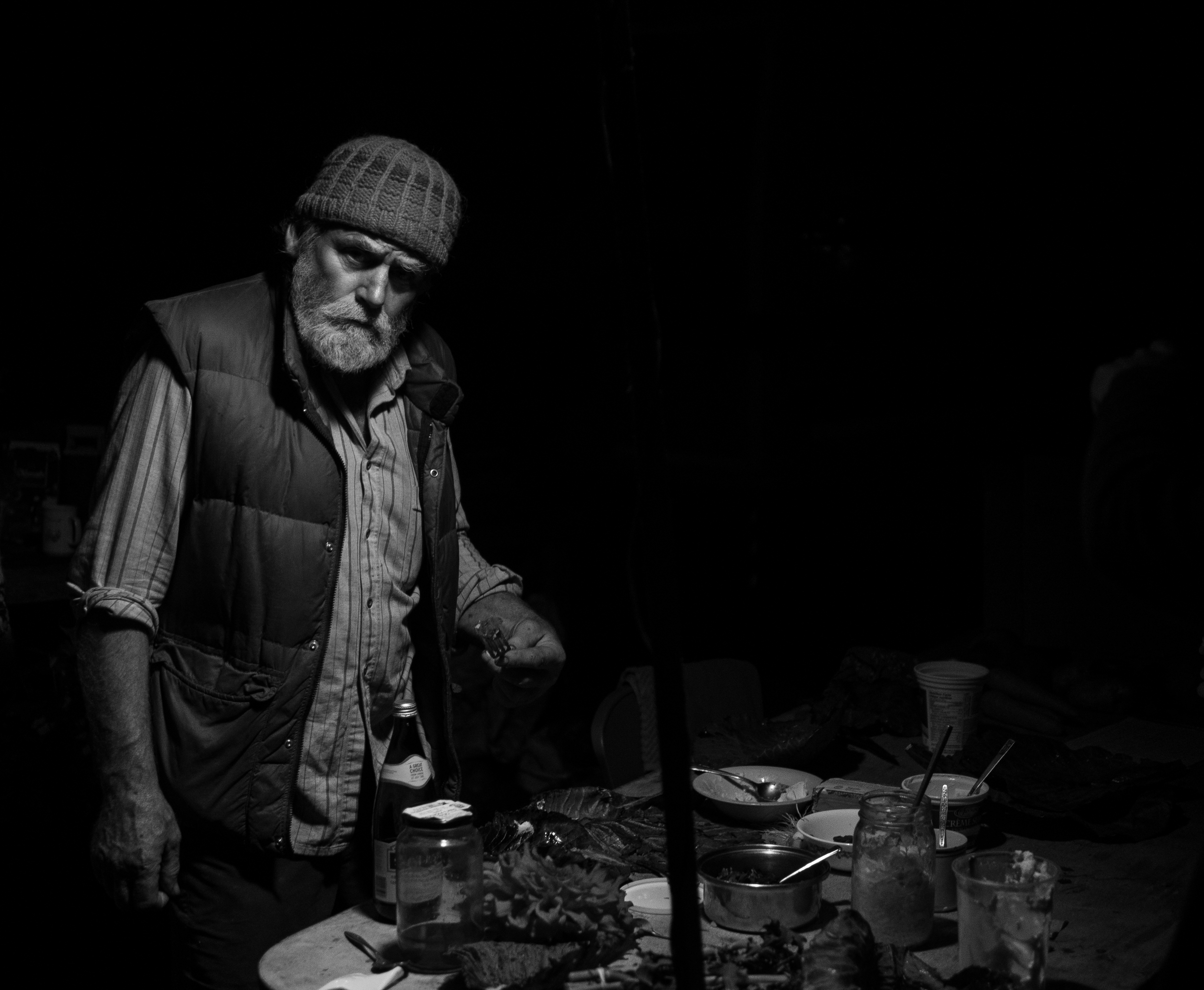 Vince grabs a late bite to eat at the McIntyre Farm's stall at the 2014 Argenta Fall Faire. His baked potatoes seem to stretch infinitely into my memories of the faire along with the sticky sweet treat of honeycomb.
