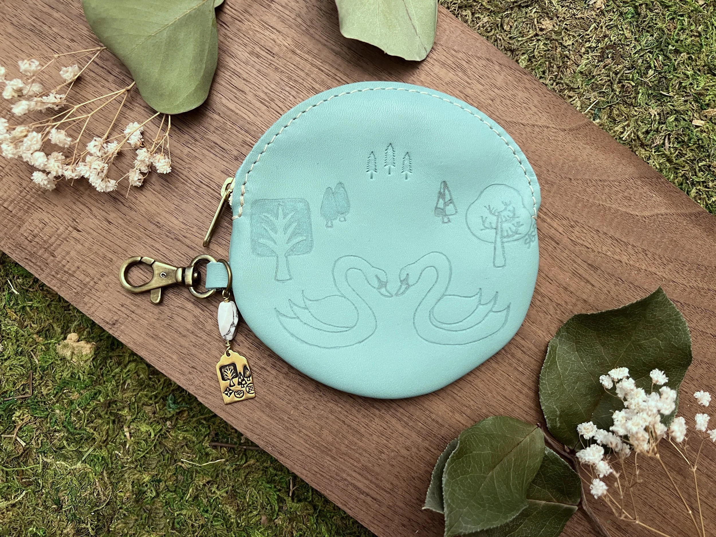 Swans and trees on Portland Leather Goods Gordita Mint