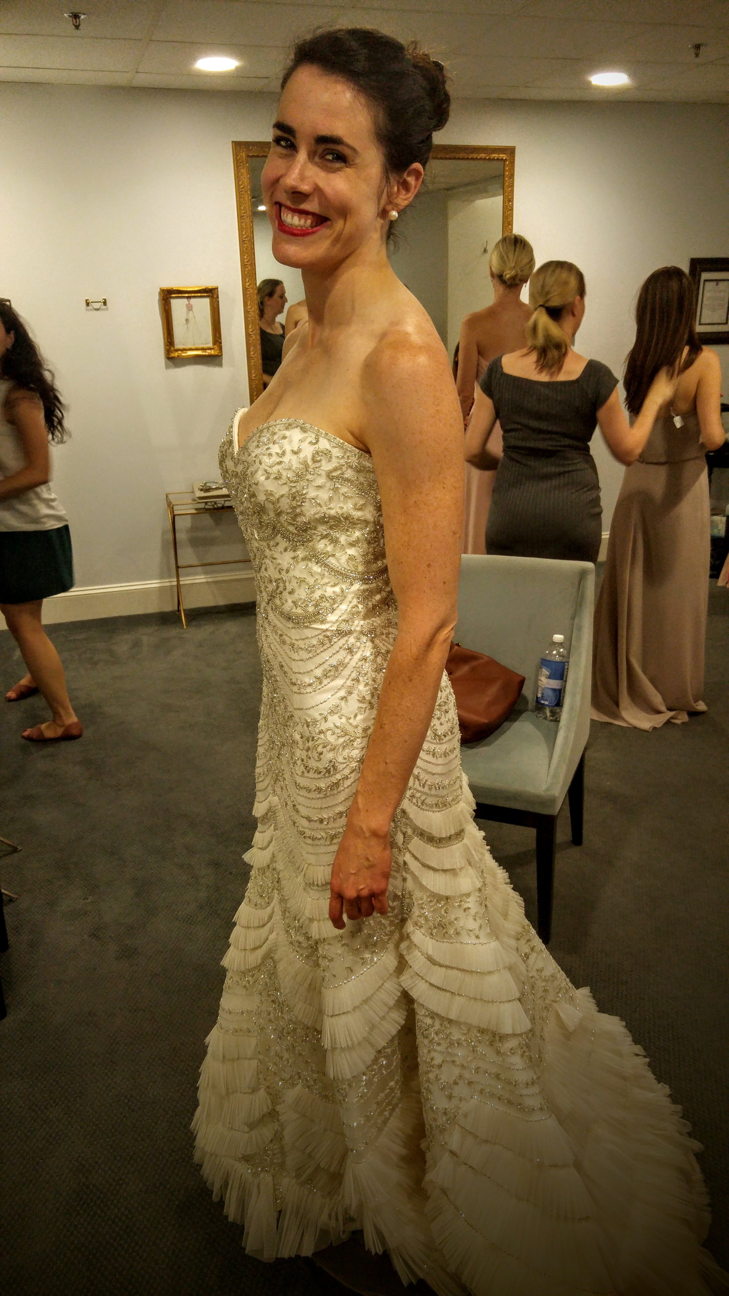 First problem: it's strapless, and would look weird with straps sown onto it. Second problem: it looks like an evening gown, not a wedding gown. Third problem: it was $5,000. 