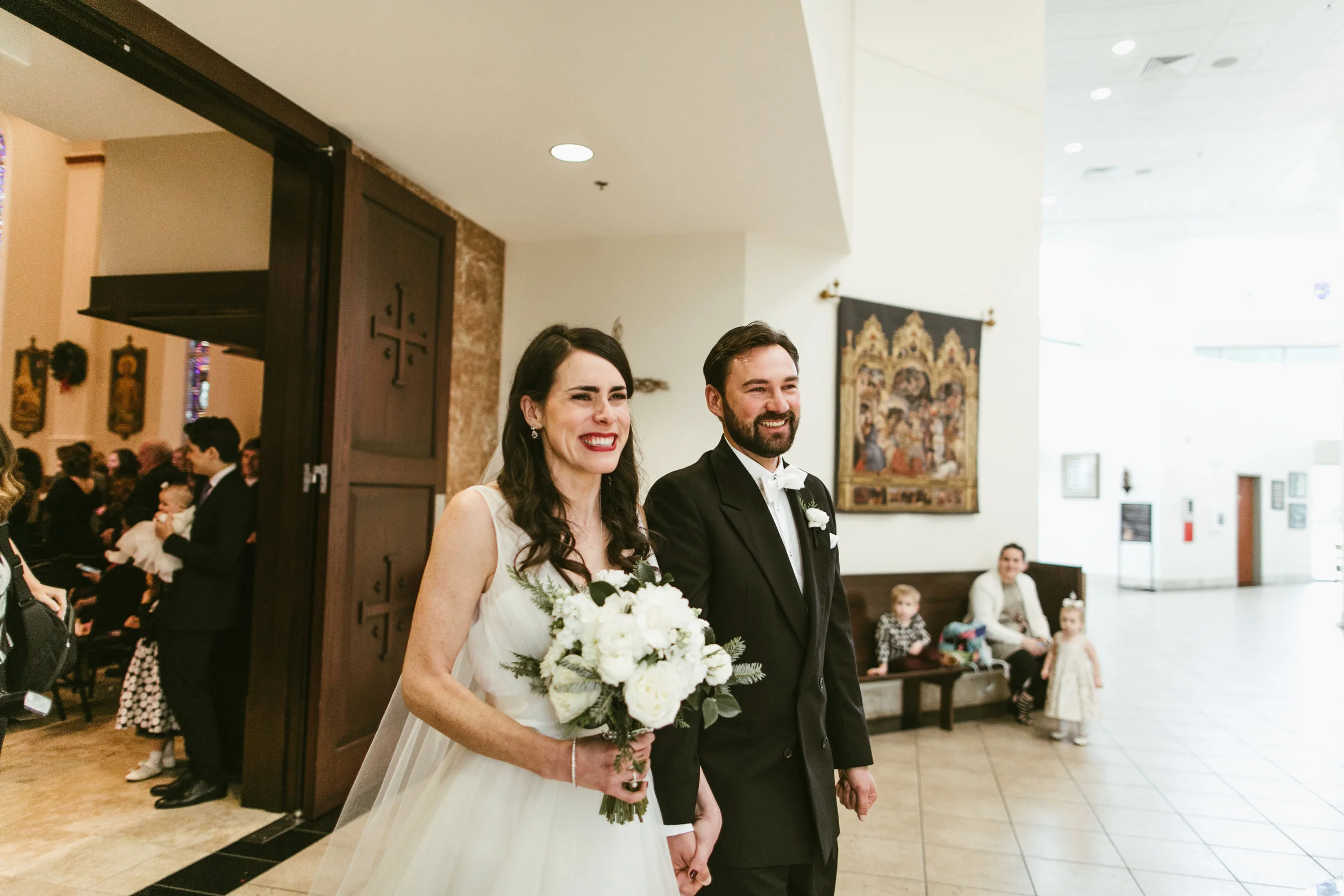 All smiles on the happiest day of our lives (so far): 12/29/16. Photo by Leah Muse. 