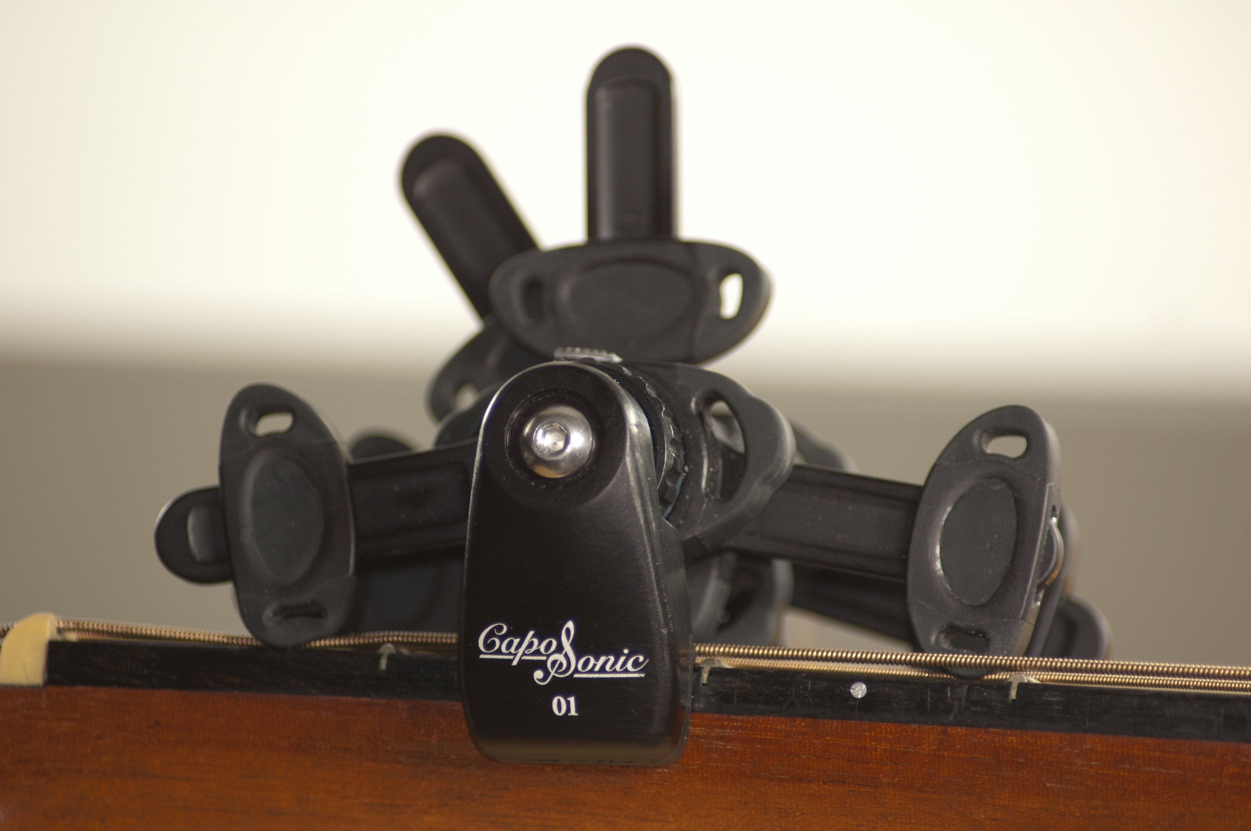 CLOSE UP OF CAPOSONIC - "SEE THE LOCKED-IN" ENGAGEMENT ON THE STRINGS