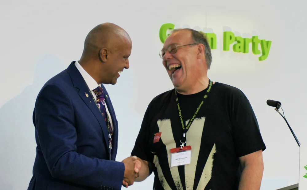 No hard feelings. Former Deputy Will Duckworth handing over the baton to Shahrar Ali, who narrowly beat him as male Deputy. Photo: Vicky Duckworth