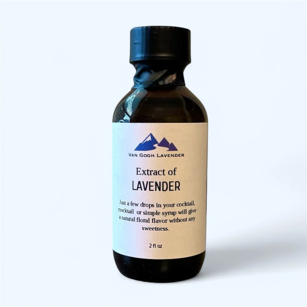 Bottle of Van Gogh Lavender extract with a white label and black cap, featuring a blue mountain logo and description of lavender extract, 2 fluid ounces.