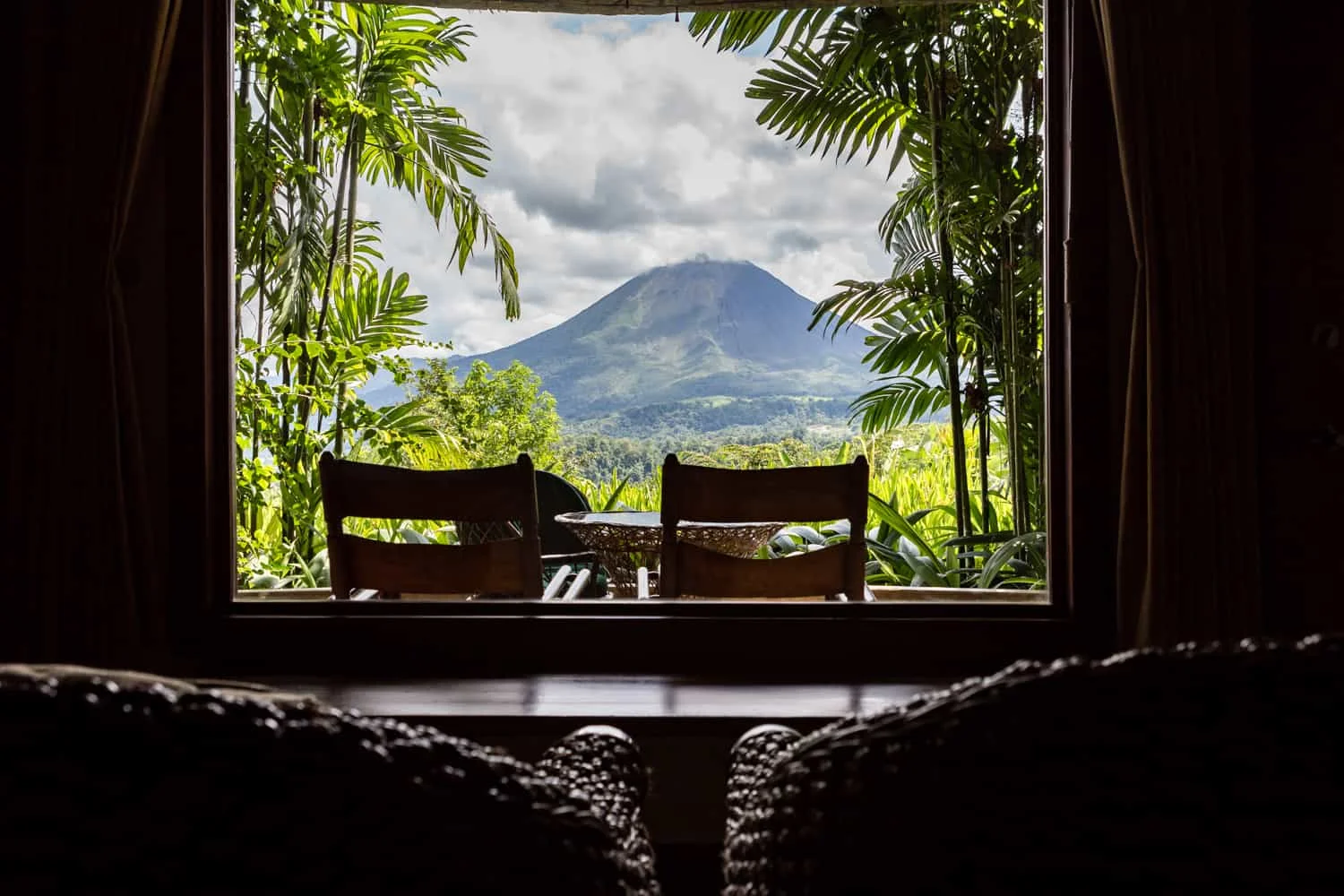 Have a seat in Springs Resort & Spa's Honeymoon Vista suite and marvel at its view of the Arenal Volcano.