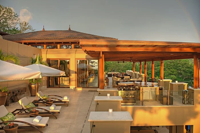 View of the covered and uncovered areas at the Main Terrace at sunset.