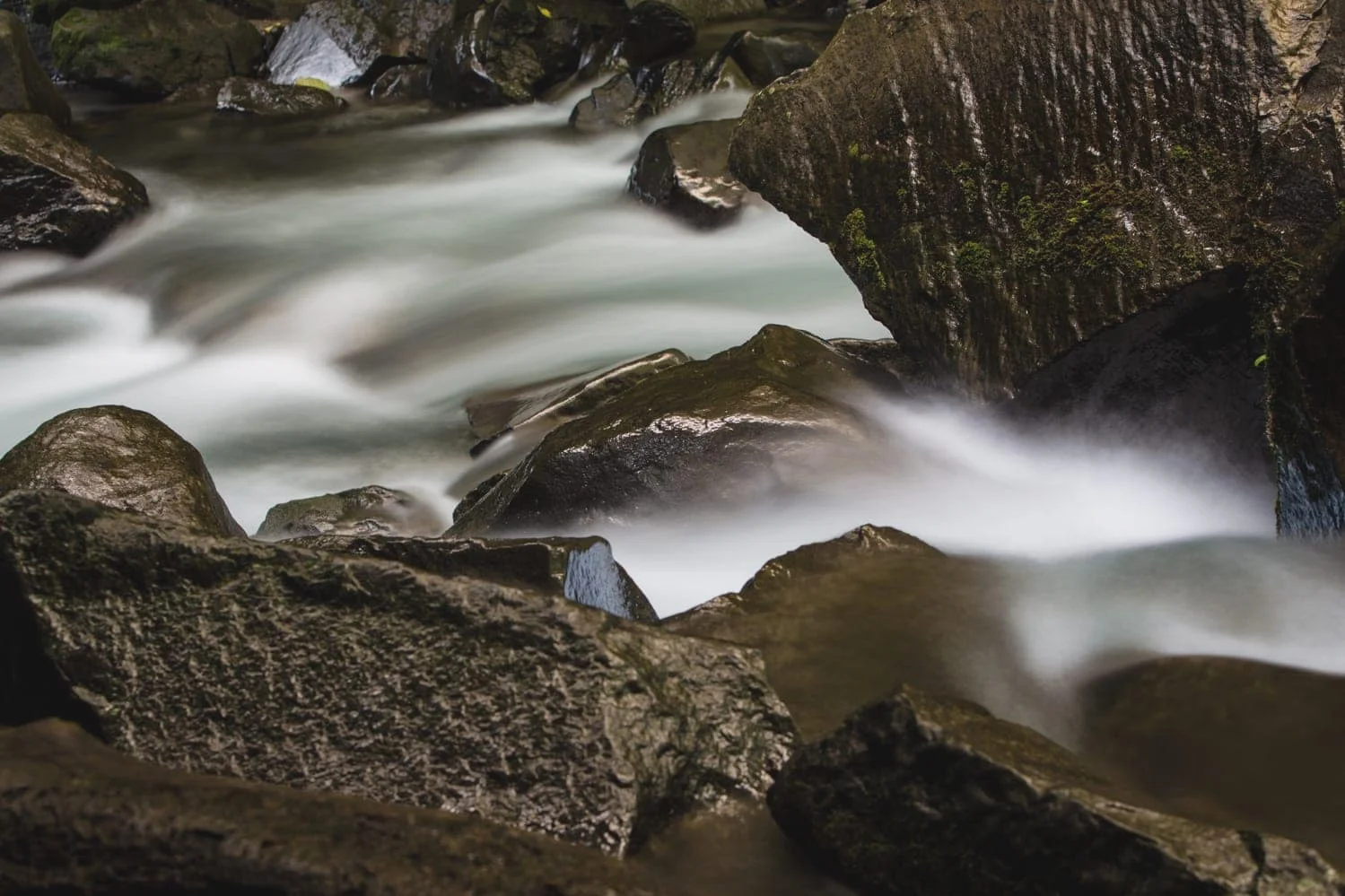 This is a long-exposure photo we took of the river flowing from the base of the La Fortuna Waterfall. It's a wonderful site to visit before or after your wedding day, and is also an amazing place for bride and groom photos.