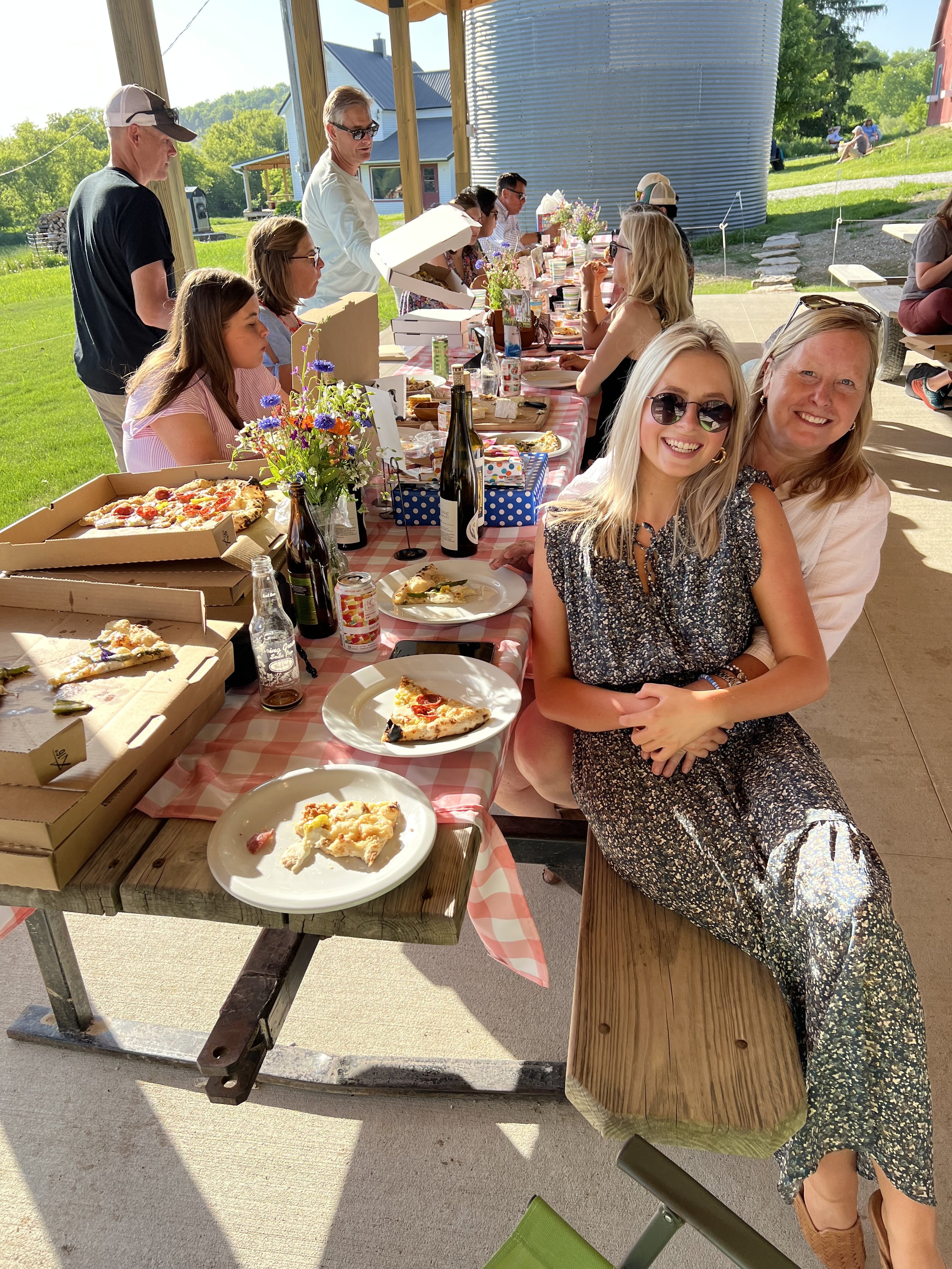 Guests enjoying a pizza party at Luna Valley - large group reservation.
