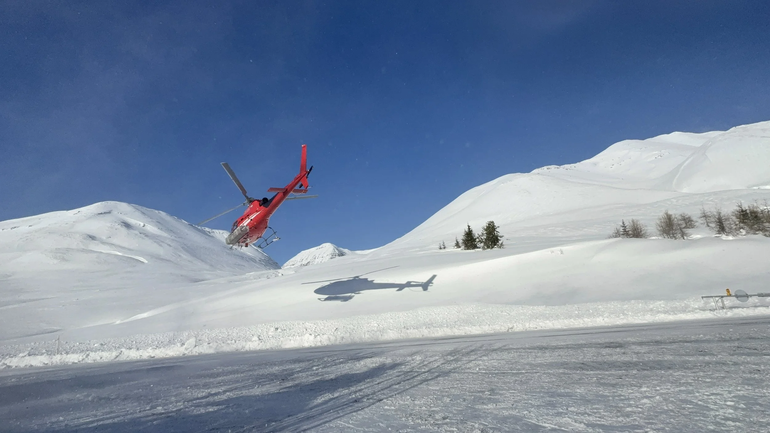 Heli LEaving lodge.jpg