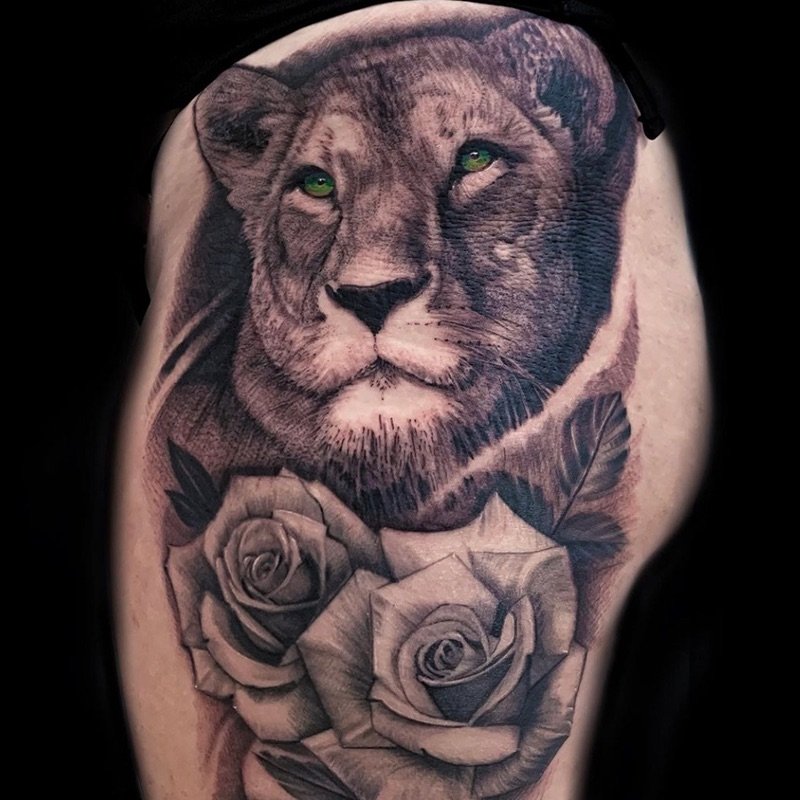 John Millan Lion Tattoo on Thigh