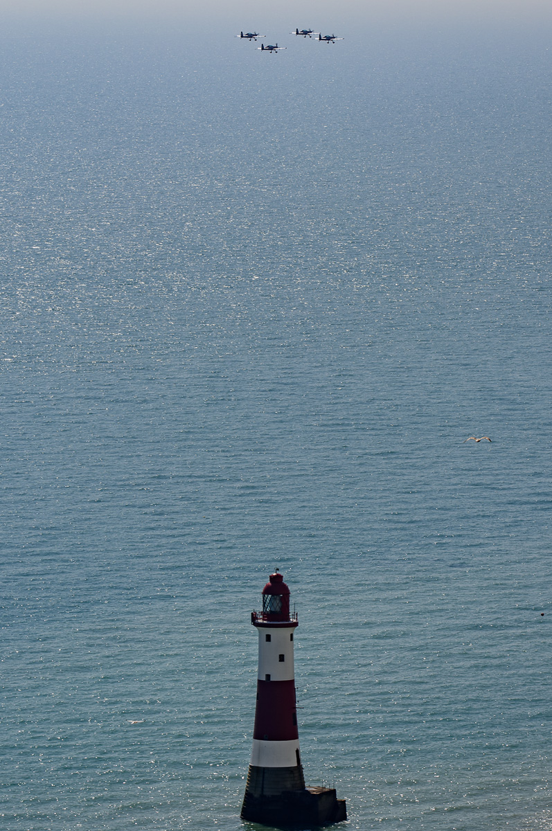 The Blades display team pass Beachy Head lighthouse