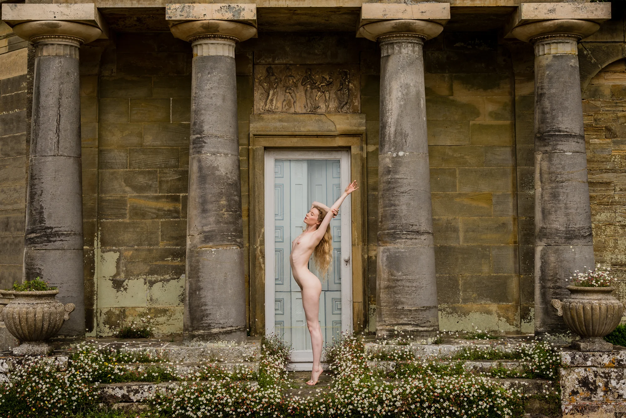 And finally - Lulu with plants in urns on plinths*
