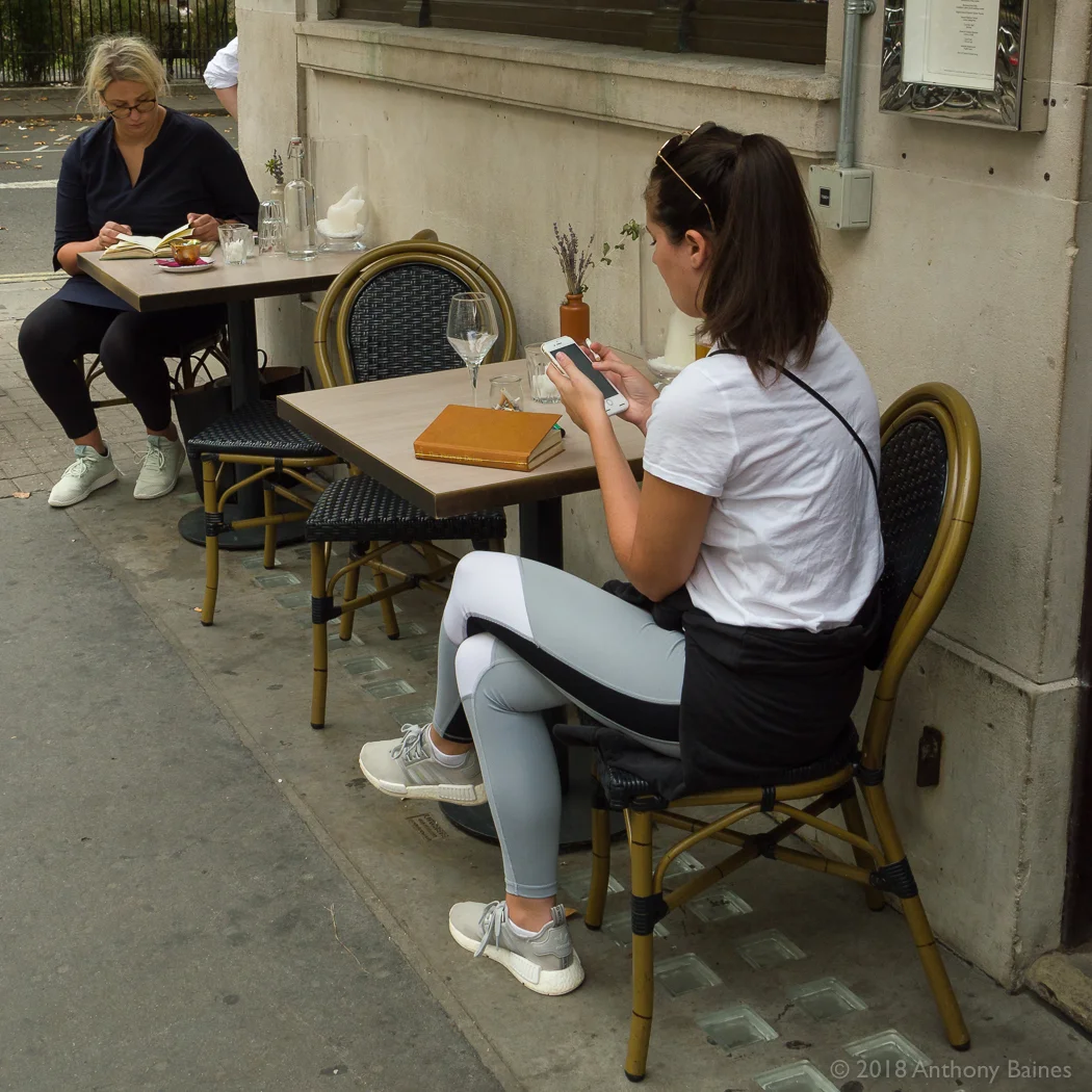 Reading the old and new way (book and phone)
