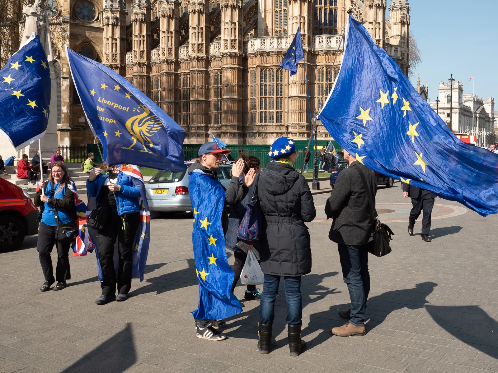 Anti-Brexit protestors with (and wrapped in) EU flags