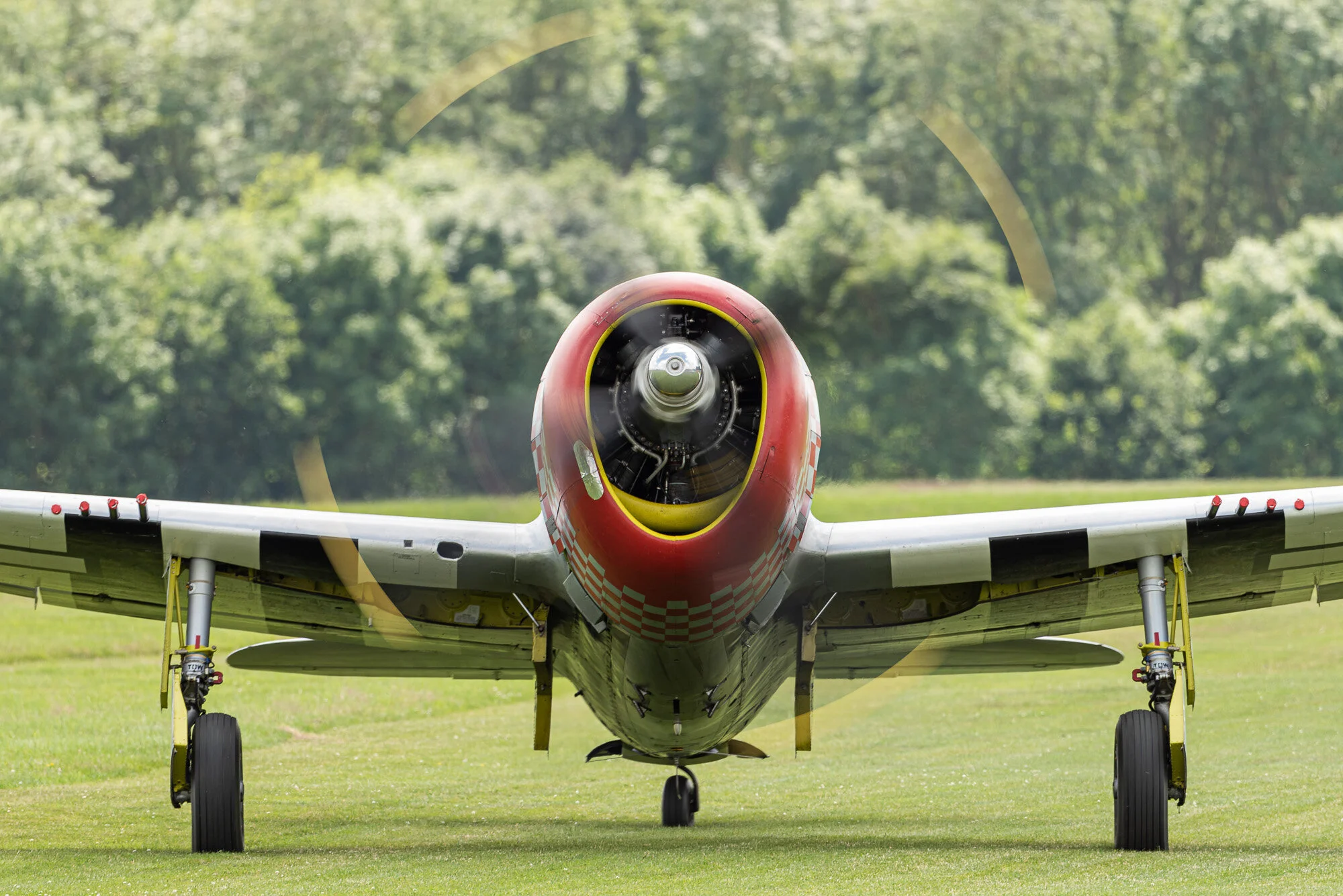The mighty Jug taxying. Republic P-47D on the grass runway at Old Warden. Nikon D810, 500mm PF at f/6.3, 1/80 sec, ISO 64. The VR works well - I found no problem getting sharp pictures at 1/80 to preserve the rotation of the prop. The trees behind give a complicated bokeh, but I don’t find this at all distracting.