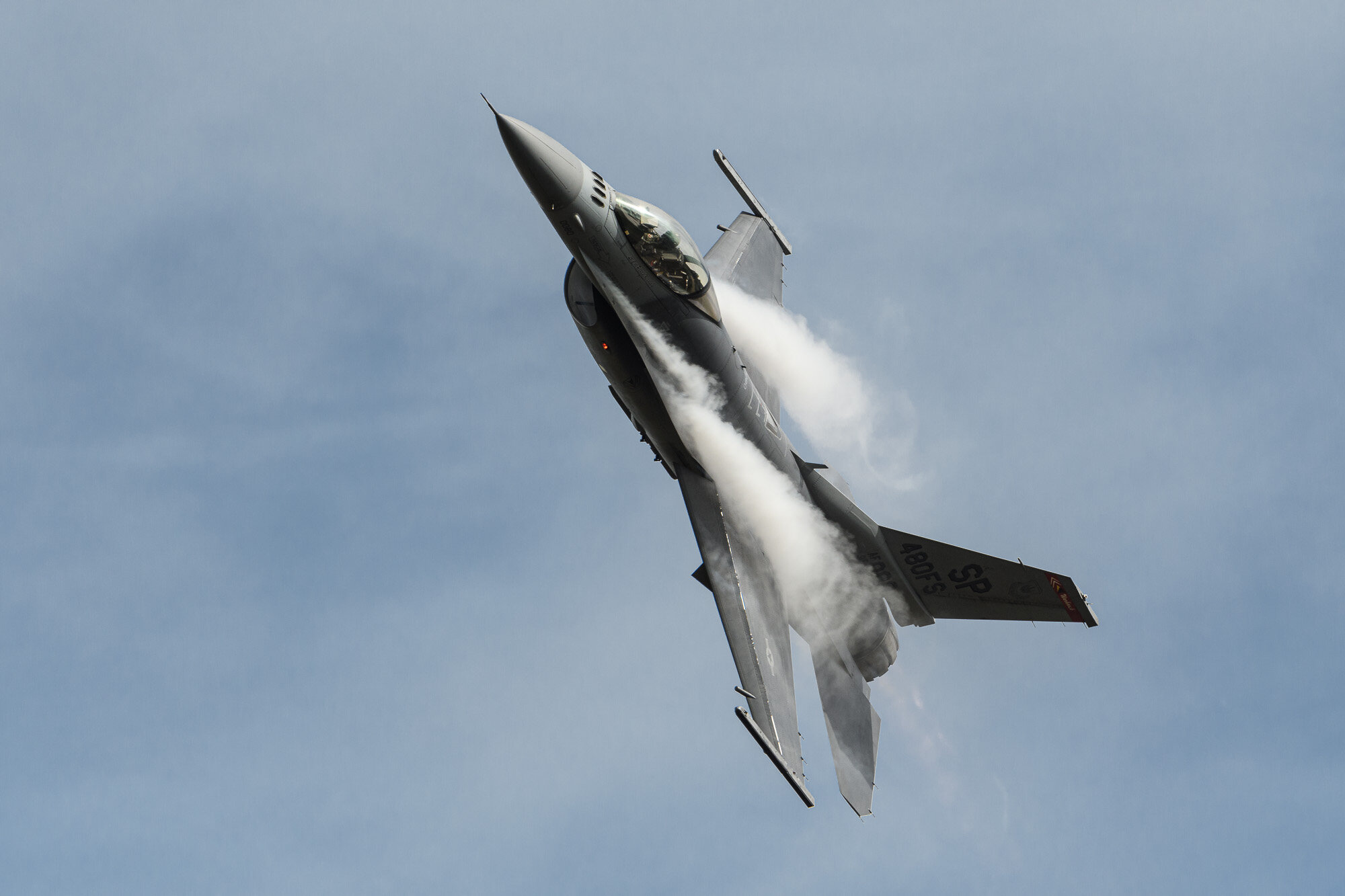 USAF F-16CM pulls vapour from the air in a high G turn