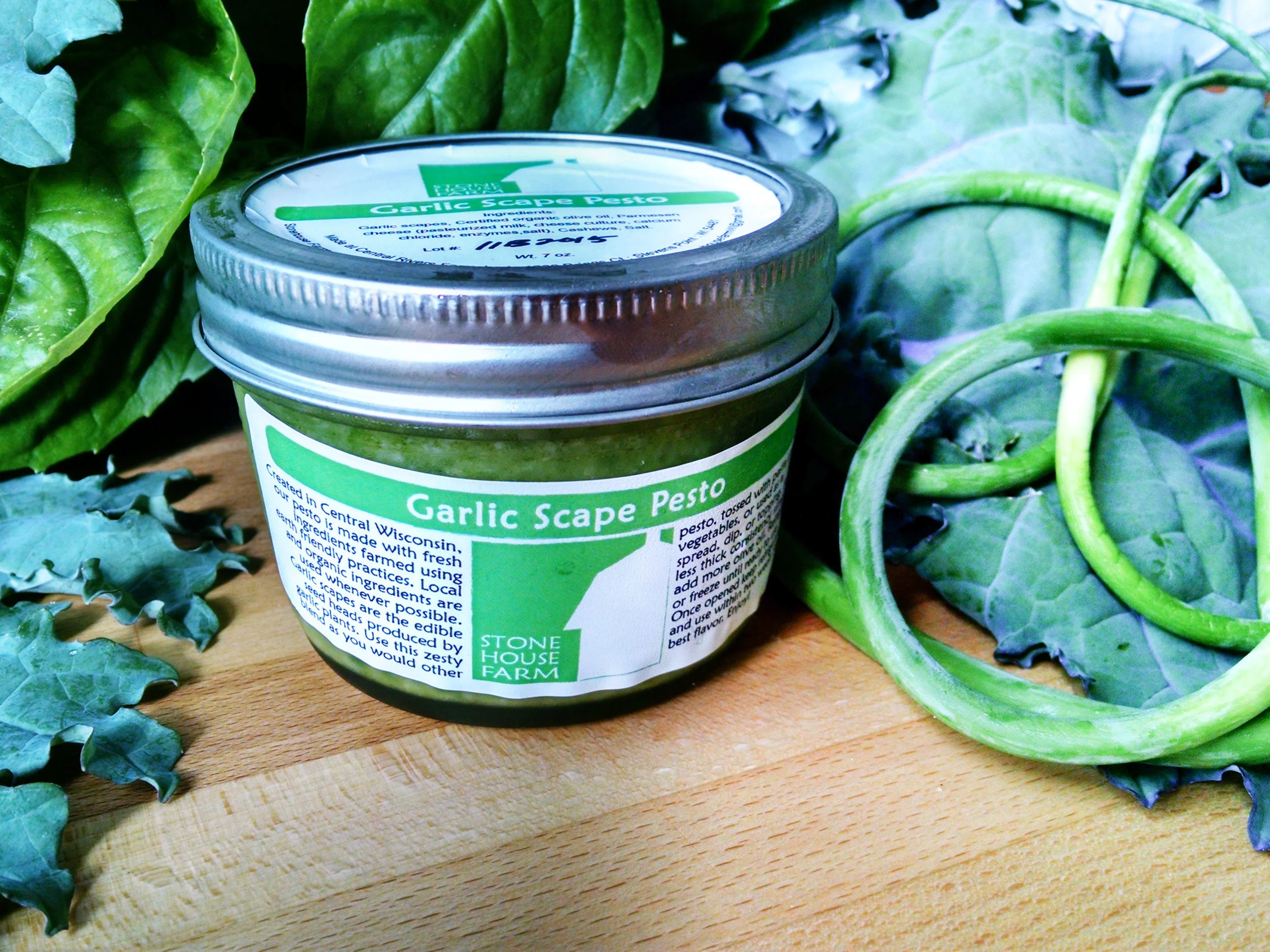 Garlic Scape Pesto: This is a rich, spicy blend of garlic scapes, certified organic olive oil, parmesan cheese, cashews, and a pinch of sea salt. If you love garlic, this pesto is for you! It can be used in a variety of ways and is delicious blended with mayonnaise or greek yogurt.