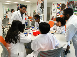 Students at the Biogen Community Lab during filming for WCVB-TV Boston's Chronicle this month.