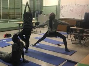 Kayla’s students show off their favorite yoga poses.