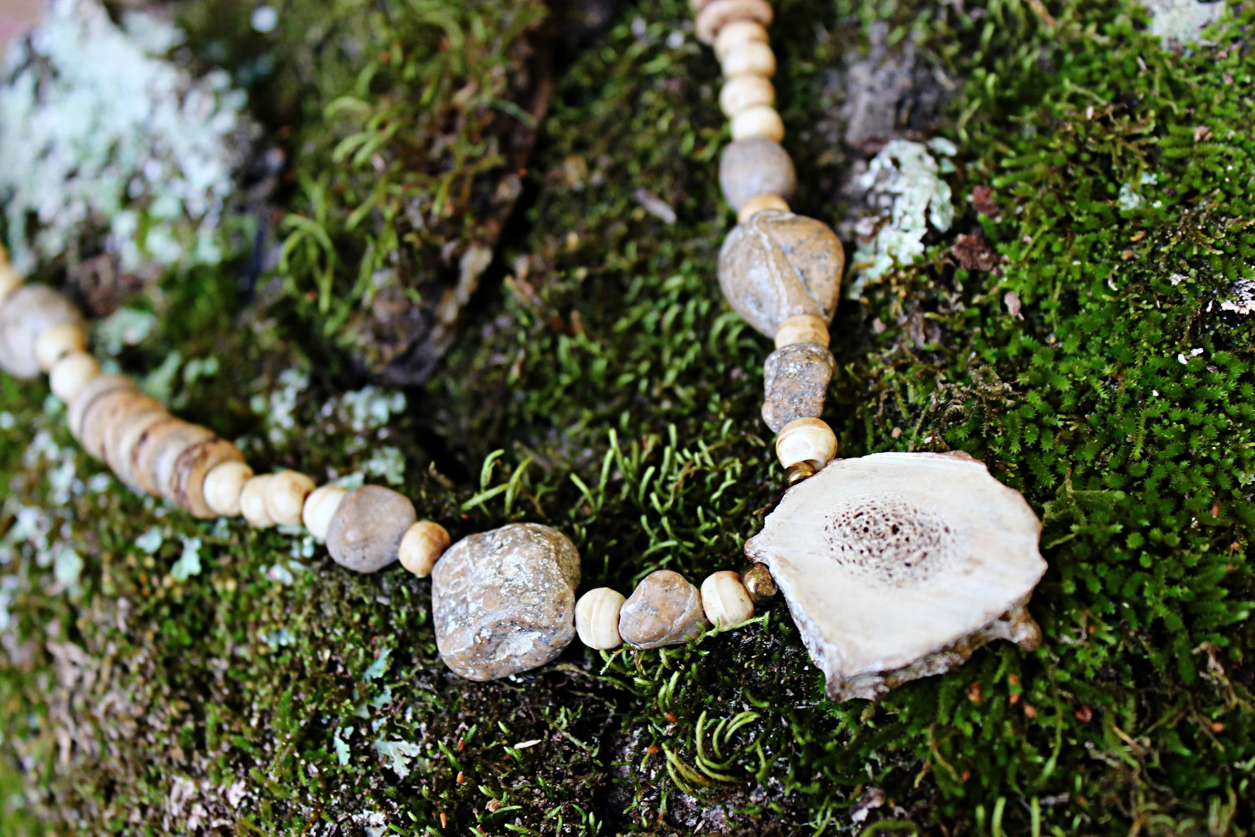 Antler Piece with River Pebbles and Bone Beads