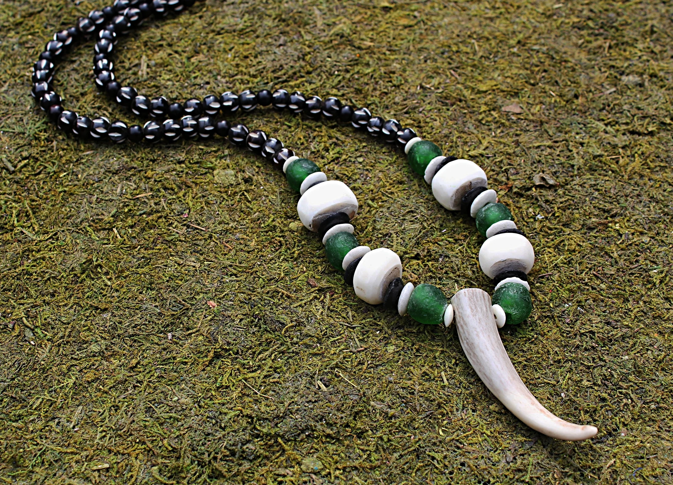 Single Tip on Green African Glass and Carved Bone Beads