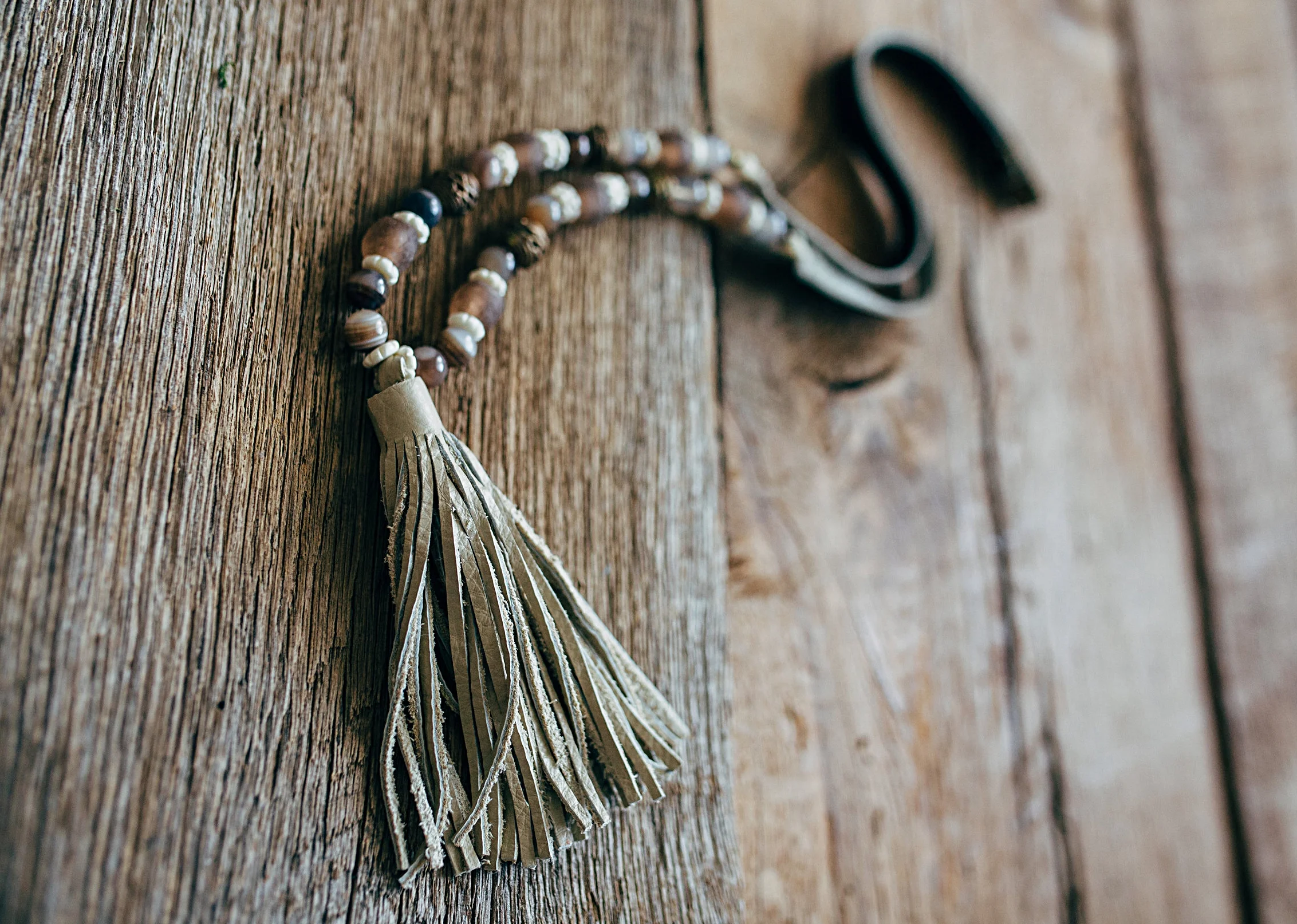 Tan Leather Tassel with Moon Stone on Leather Strap 