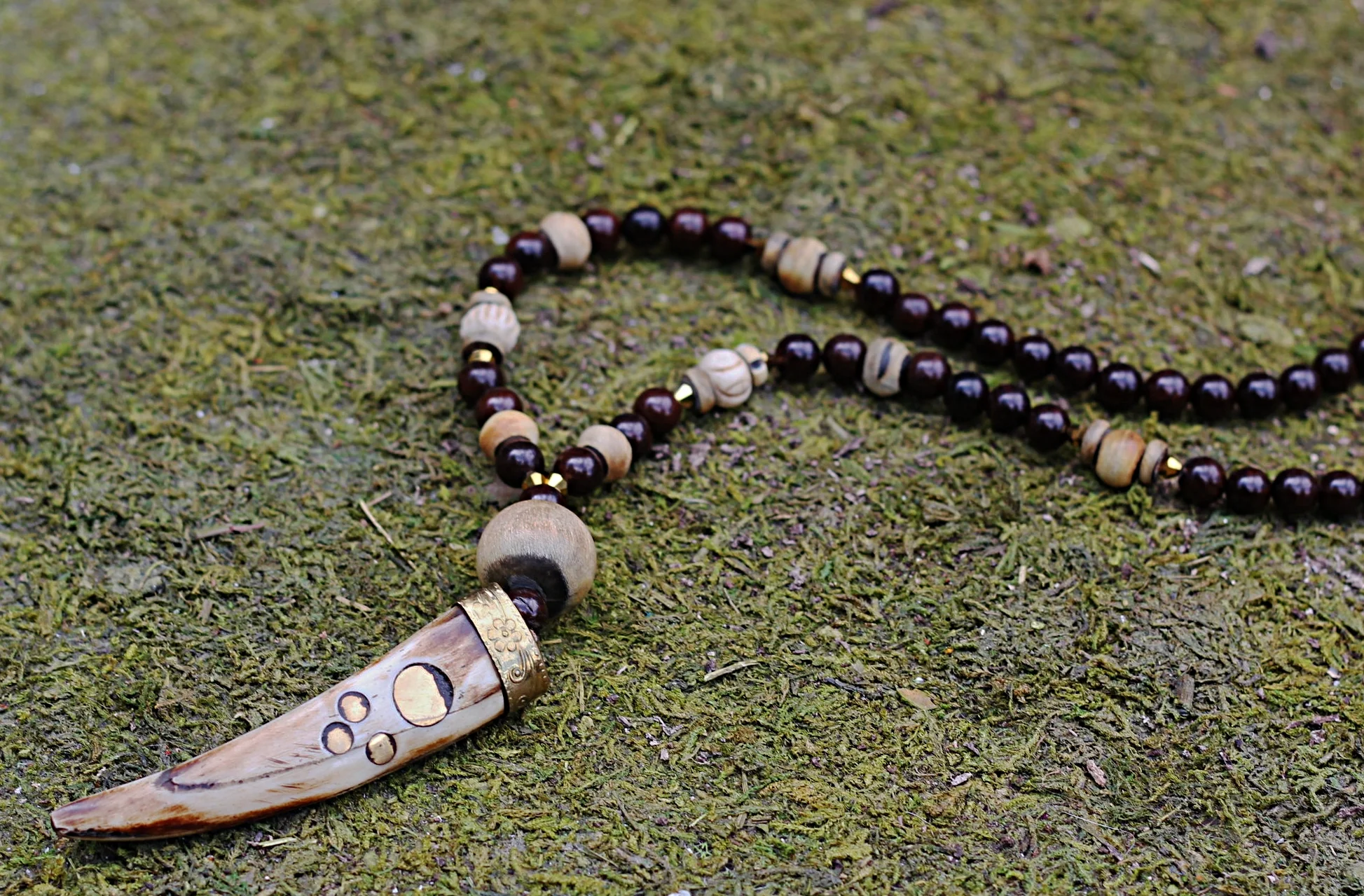 Wooden Tusk on Driftwood 