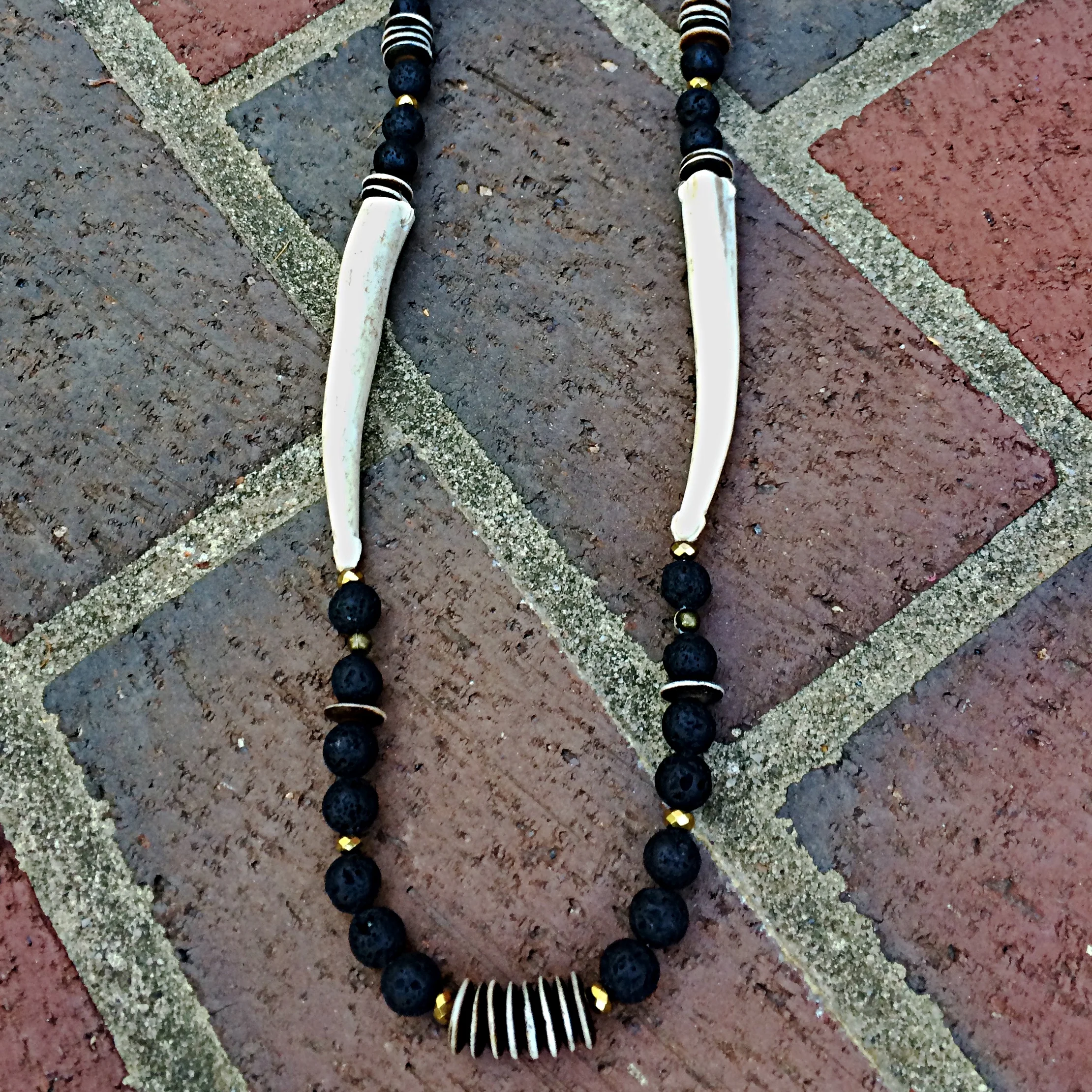 2 Antler Tips on Black Lava Rock