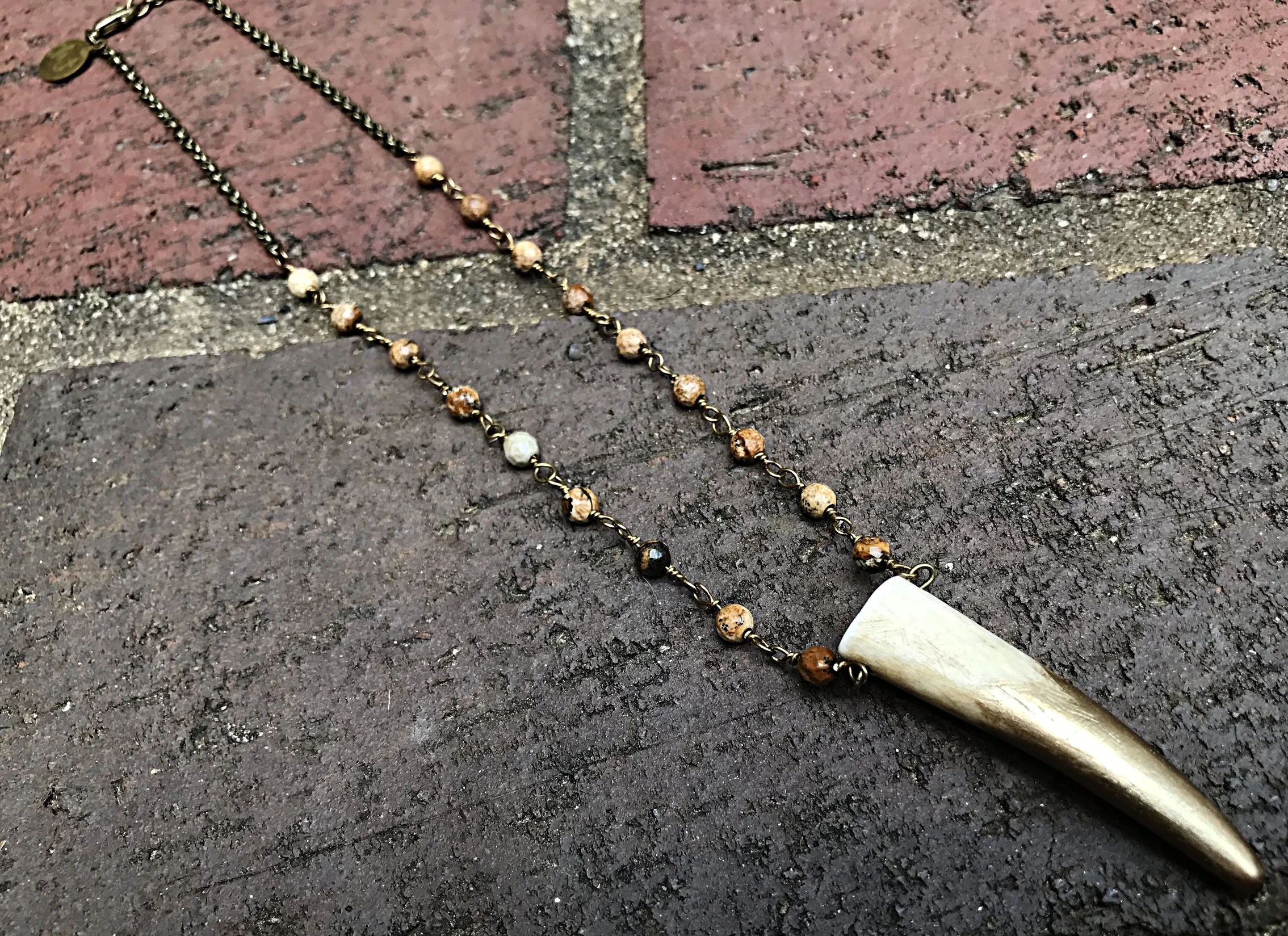 Gold Dipped Antler Shorty on Jasper