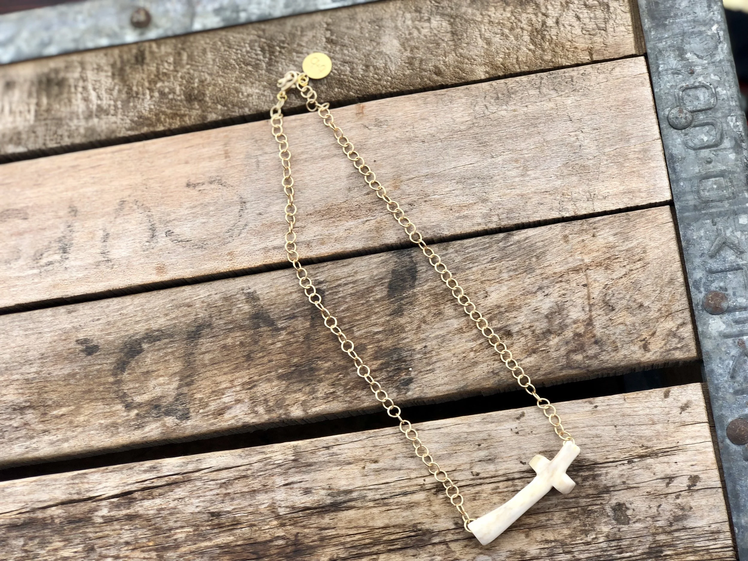 White Cross on Gold Chain