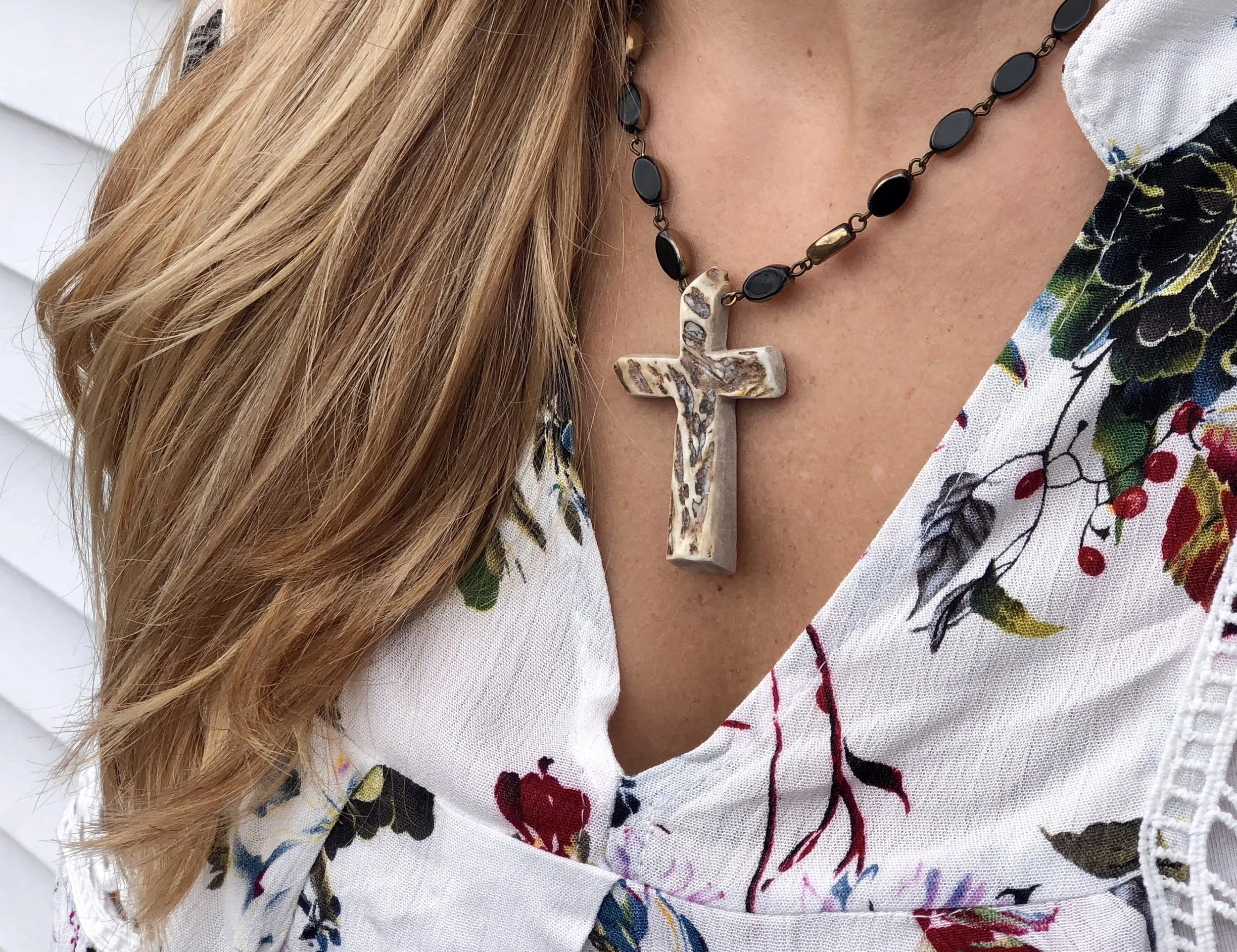Gnarly Antler Cross on Black Agate 