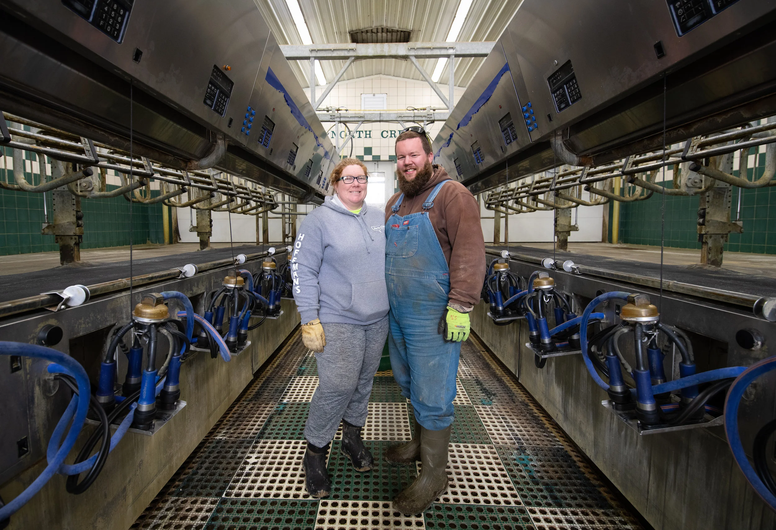 In the milking parlor. Photo by Alicia Cory from Shotcha Photography
