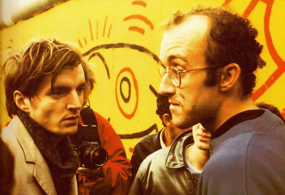 Thierry Noir and Keith Harring at the Berlin wall