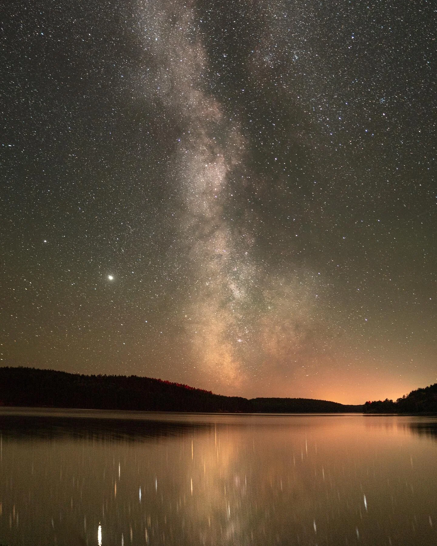 Watching the sun fade away and the Milky Way rise across the summer night sky. If you look closely you can see the red tree tops from a passing train 🚂